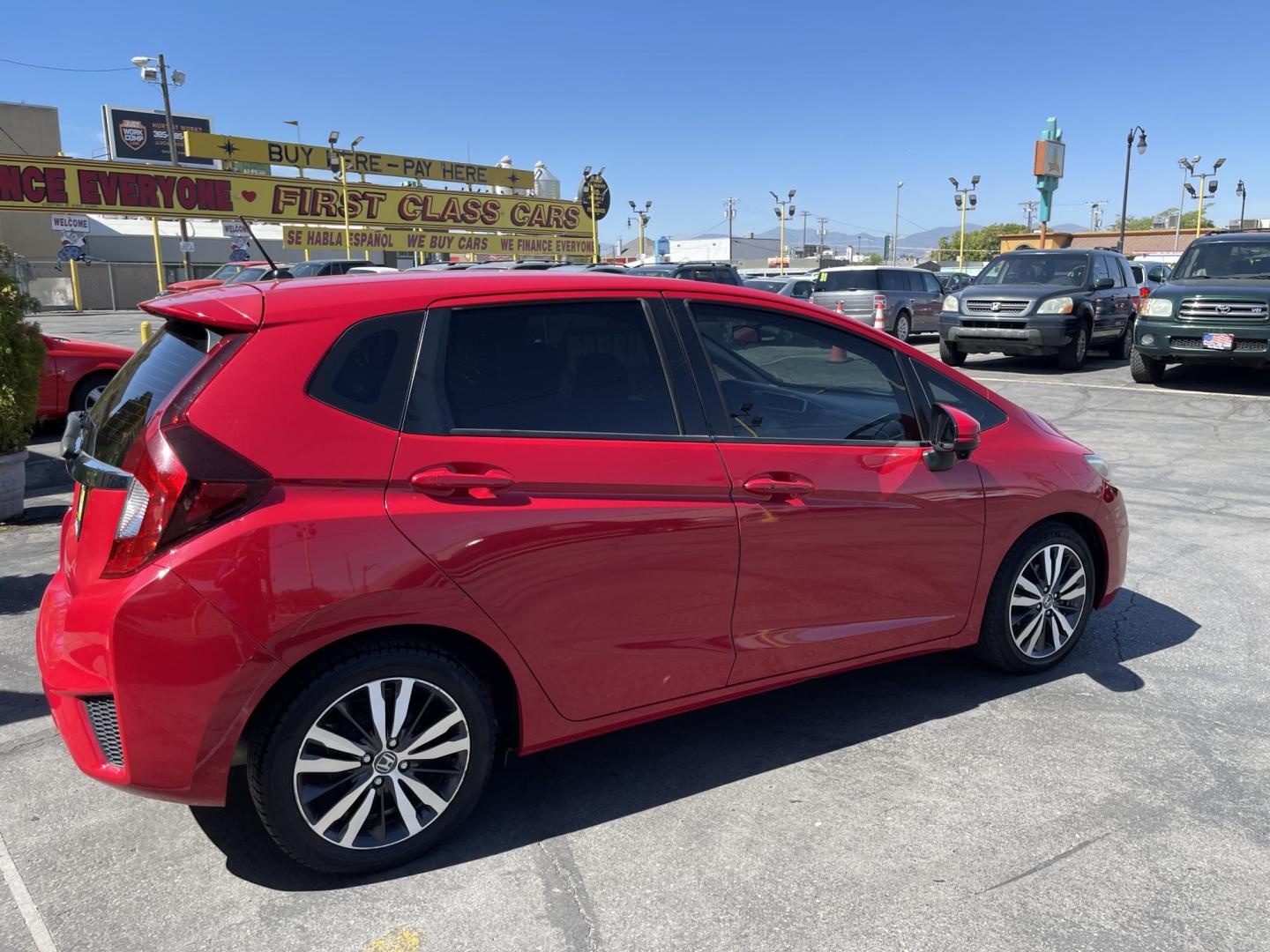 2016 Flame Red /BLACK Honda Fit EX CVT (JHMGK5H71GX) with an 1.5L L4 SOHC 16V engine, CVT transmission, located at 801 South State Street, Salt Lake City, UT, 84111, (801) 328-0098, 40.751953, -111.888206 - Clean title!!! This one is a must see in excellent condition for the year, make and miles! Has been cared for and serviced regularly as stated on the Carfax. Immaculate inside and out come see for yourself today! Great gas mileage this averages 33 MPG city / 41 MPG highway / 36 combined MPG impressi - Photo#6