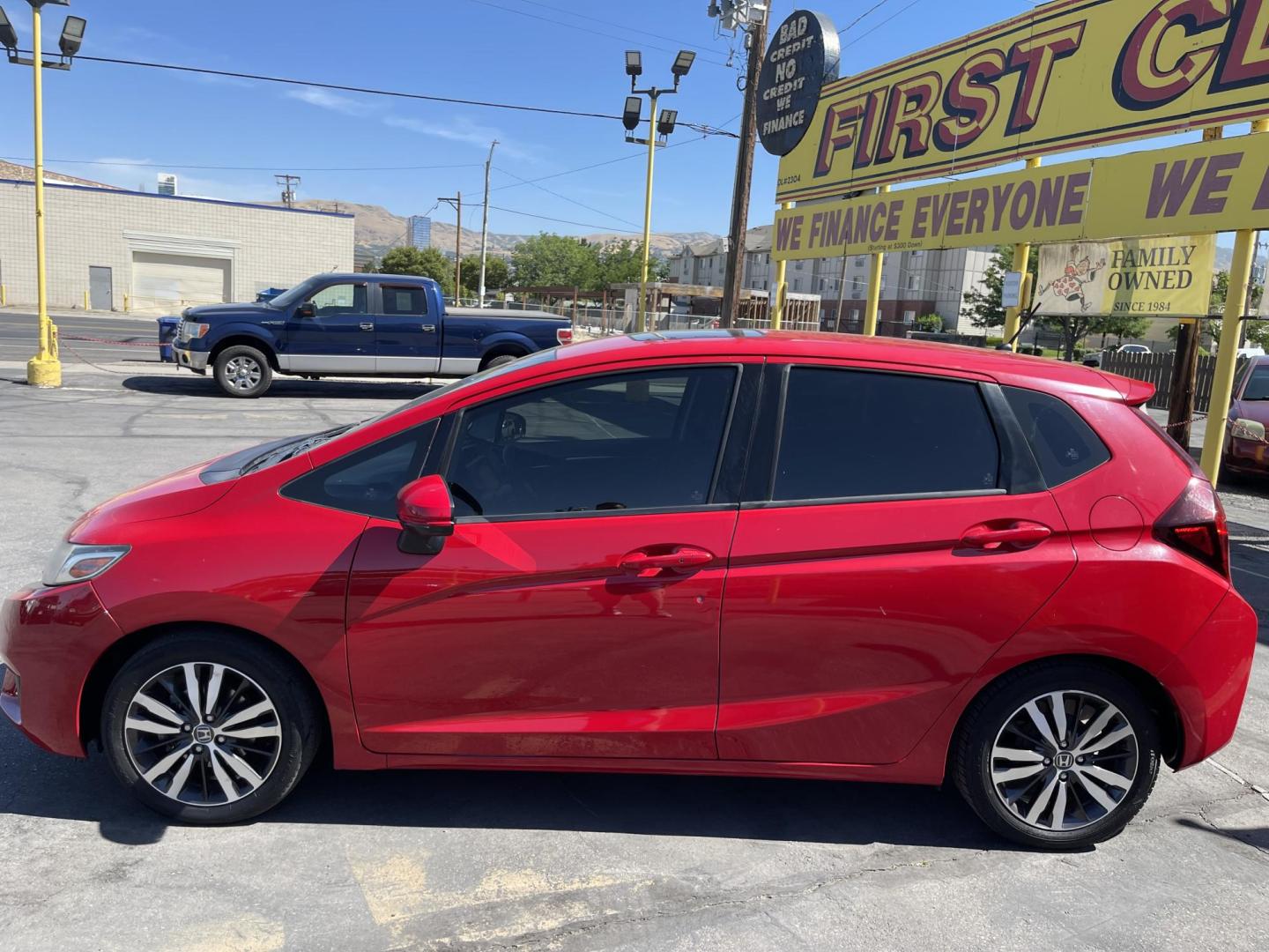 2016 Flame Red /BLACK Honda Fit EX CVT (JHMGK5H71GX) with an 1.5L L4 SOHC 16V engine, CVT transmission, located at 801 South State Street, Salt Lake City, UT, 84111, (801) 328-0098, 40.751953, -111.888206 - Clean title!!! This one is a must see in excellent condition for the year, make and miles! Has been cared for and serviced regularly as stated on the Carfax. Immaculate inside and out come see for yourself today! Great gas mileage this averages 33 MPG city / 41 MPG highway / 36 combined MPG impressi - Photo#9