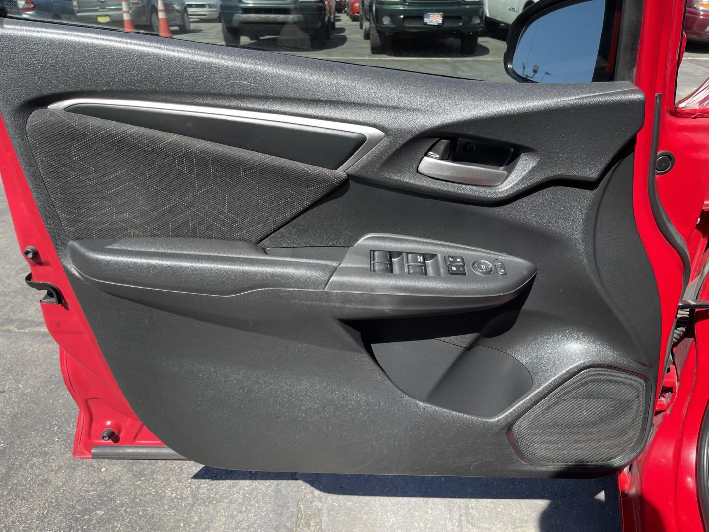 2016 Flame Red /BLACK Honda Fit EX CVT (JHMGK5H71GX) with an 1.5L L4 SOHC 16V engine, CVT transmission, located at 801 South State Street, Salt Lake City, UT, 84111, (801) 328-0098, 40.751953, -111.888206 - Clean title!!! This one is a must see in excellent condition for the year, make and miles! Has been cared for and serviced regularly as stated on the Carfax. Immaculate inside and out come see for yourself today! Great gas mileage this averages 33 MPG city / 41 MPG highway / 36 combined MPG impressi - Photo#18