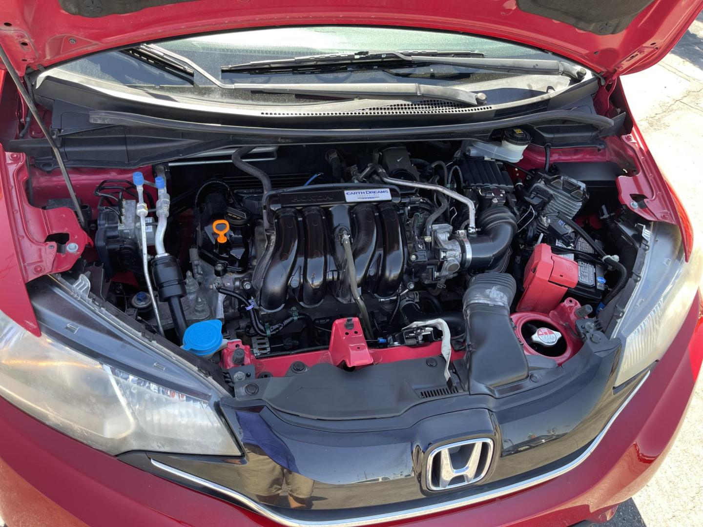 2016 Flame Red /BLACK Honda Fit EX CVT (JHMGK5H71GX) with an 1.5L L4 SOHC 16V engine, CVT transmission, located at 801 South State Street, Salt Lake City, UT, 84111, (801) 328-0098, 40.751953, -111.888206 - Clean title!!! This one is a must see in excellent condition for the year, make and miles! Has been cared for and serviced regularly as stated on the Carfax. Immaculate inside and out come see for yourself today! Great gas mileage this averages 33 MPG city / 41 MPG highway / 36 combined MPG impressi - Photo#26
