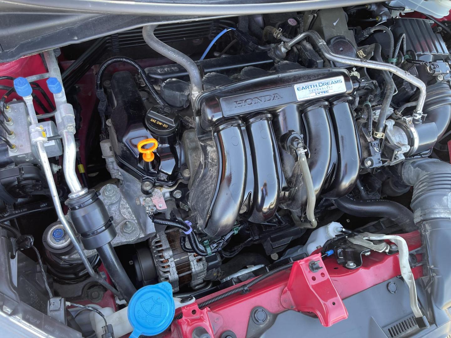 2016 Flame Red /BLACK Honda Fit EX CVT (JHMGK5H71GX) with an 1.5L L4 SOHC 16V engine, CVT transmission, located at 801 South State Street, Salt Lake City, UT, 84111, (801) 328-0098, 40.751953, -111.888206 - Clean title!!! This one is a must see in excellent condition for the year, make and miles! Has been cared for and serviced regularly as stated on the Carfax. Immaculate inside and out come see for yourself today! Great gas mileage this averages 33 MPG city / 41 MPG highway / 36 combined MPG impressi - Photo#27
