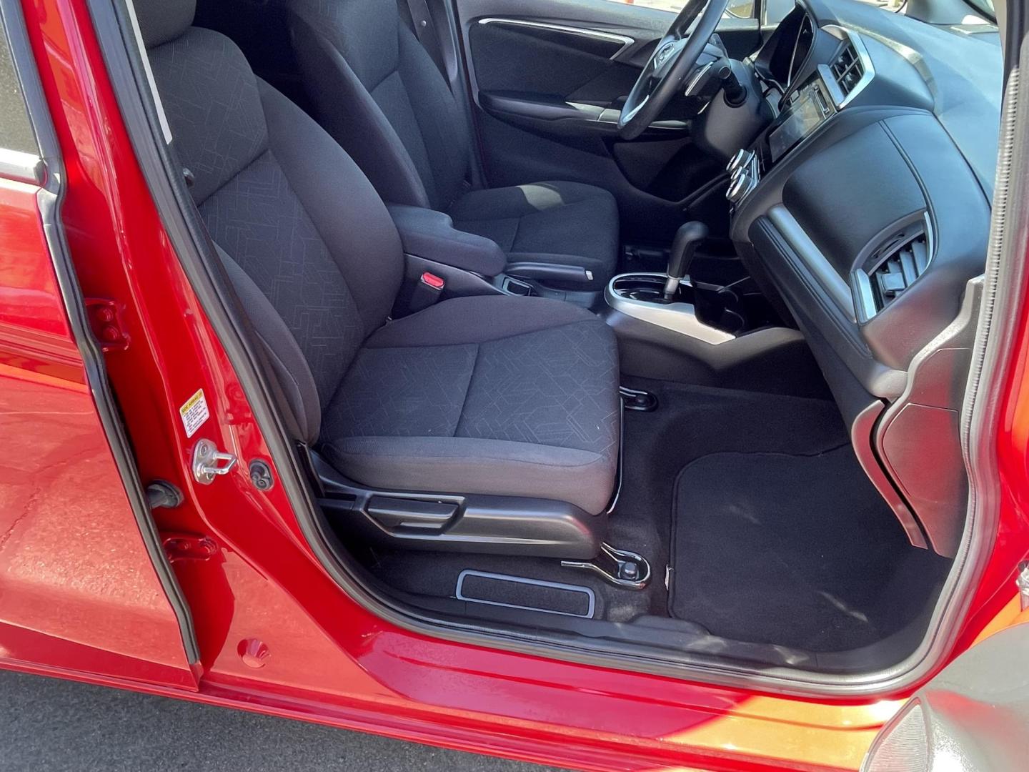 2016 Flame Red /BLACK Honda Fit EX CVT (JHMGK5H71GX) with an 1.5L L4 SOHC 16V engine, CVT transmission, located at 801 South State Street, Salt Lake City, UT, 84111, (801) 328-0098, 40.751953, -111.888206 - Clean title!!! This one is a must see in excellent condition for the year, make and miles! Has been cared for and serviced regularly as stated on the Carfax. Immaculate inside and out come see for yourself today! Great gas mileage this averages 33 MPG city / 41 MPG highway / 36 combined MPG impressi - Photo#33