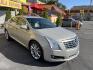 2014 Silver Sky Metallic /Tan Cadillac XTS Standard FWD (2G61L5S36E9) with an 3.6L V6 DOHC 24V engine, 6-Speed Automatic transmission, located at 801 South State Street, Salt Lake City, UT, 84111, (801) 328-0098, 40.751953, -111.888206 - Clean title! 1 Owner No accidents on Carfax!!! Carfax show this was meticulously maintained and serviced! Carfax shows regular oil changes were done and regular service intervals were taken care of. This was a new car dealer trade in that we took in it was an older retired gentlemen we were told tha - Photo#4