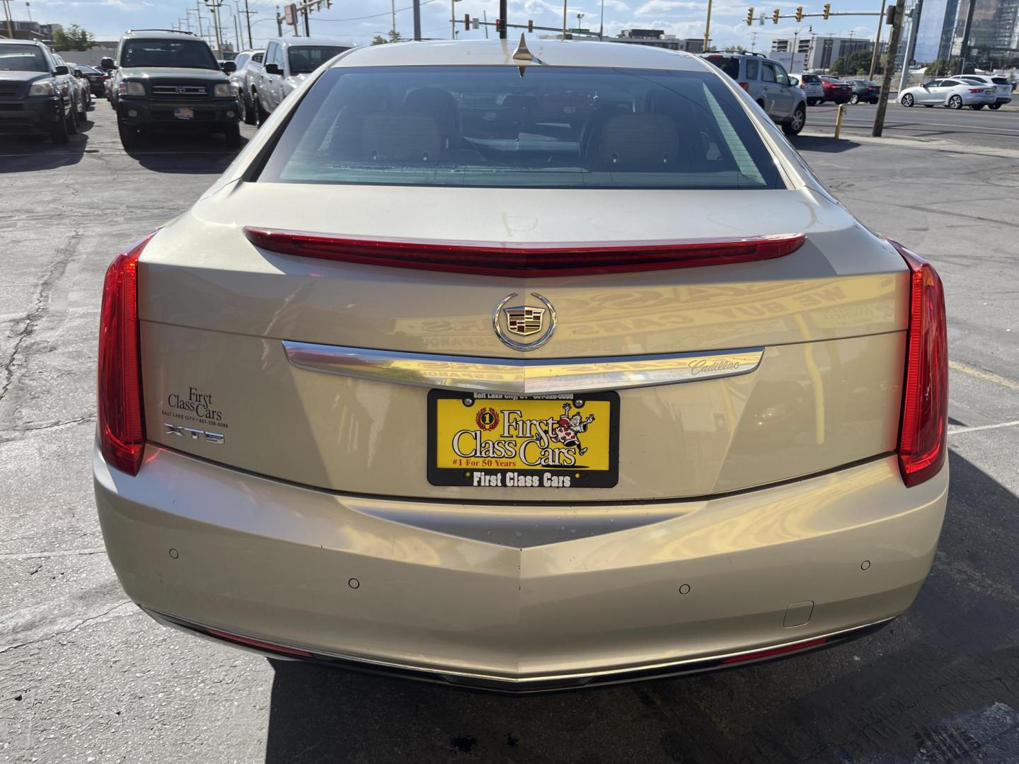 2014 Silver Sky Metallic /Tan Cadillac XTS Standard FWD (2G61L5S36E9) with an 3.6L V6 DOHC 24V engine, 6-Speed Automatic transmission, located at 801 South State Street, Salt Lake City, UT, 84111, (801) 328-0098, 40.751953, -111.888206 - Clean title! 1 Owner No accidents on Carfax!!! Carfax show this was meticulously maintained and serviced! Carfax shows regular oil changes were done and regular service intervals were taken care of. This was a new car dealer trade in that we took in it was an older retired gentlemen we were told tha - Photo#6