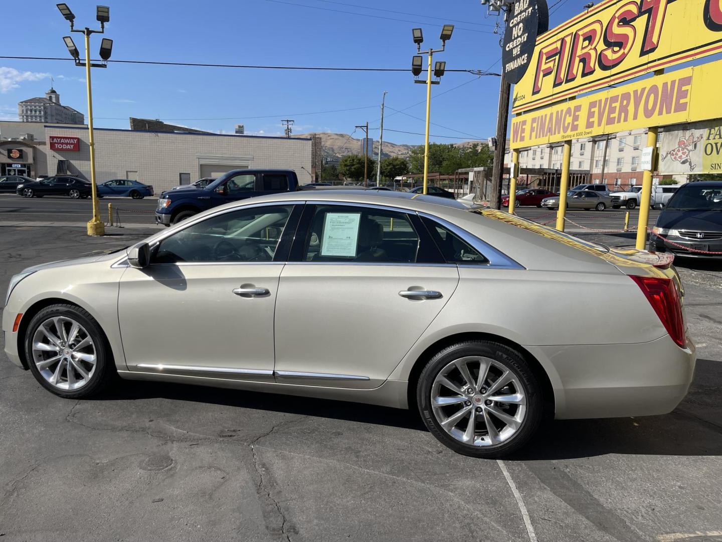 2014 Silver Sky Metallic /Tan Cadillac XTS Standard FWD (2G61L5S36E9) with an 3.6L V6 DOHC 24V engine, 6-Speed Automatic transmission, located at 801 South State Street, Salt Lake City, UT, 84111, (801) 328-0098, 40.751953, -111.888206 - Clean title! 1 Owner No accidents on Carfax!!! Carfax show this was meticulously maintained and serviced! Carfax shows regular oil changes were done and regular service intervals were taken care of. This was a new car dealer trade in that we took in it was an older retired gentlemen we were told tha - Photo#9