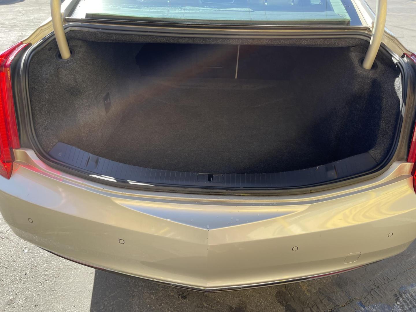 2014 Silver Sky Metallic /Tan Cadillac XTS Standard FWD (2G61L5S36E9) with an 3.6L V6 DOHC 24V engine, 6-Speed Automatic transmission, located at 801 South State Street, Salt Lake City, UT, 84111, (801) 328-0098, 40.751953, -111.888206 - Clean title! 1 Owner No accidents on Carfax!!! Carfax show this was meticulously maintained and serviced! Carfax shows regular oil changes were done and regular service intervals were taken care of. This was a new car dealer trade in that we took in it was an older retired gentlemen we were told tha - Photo#26