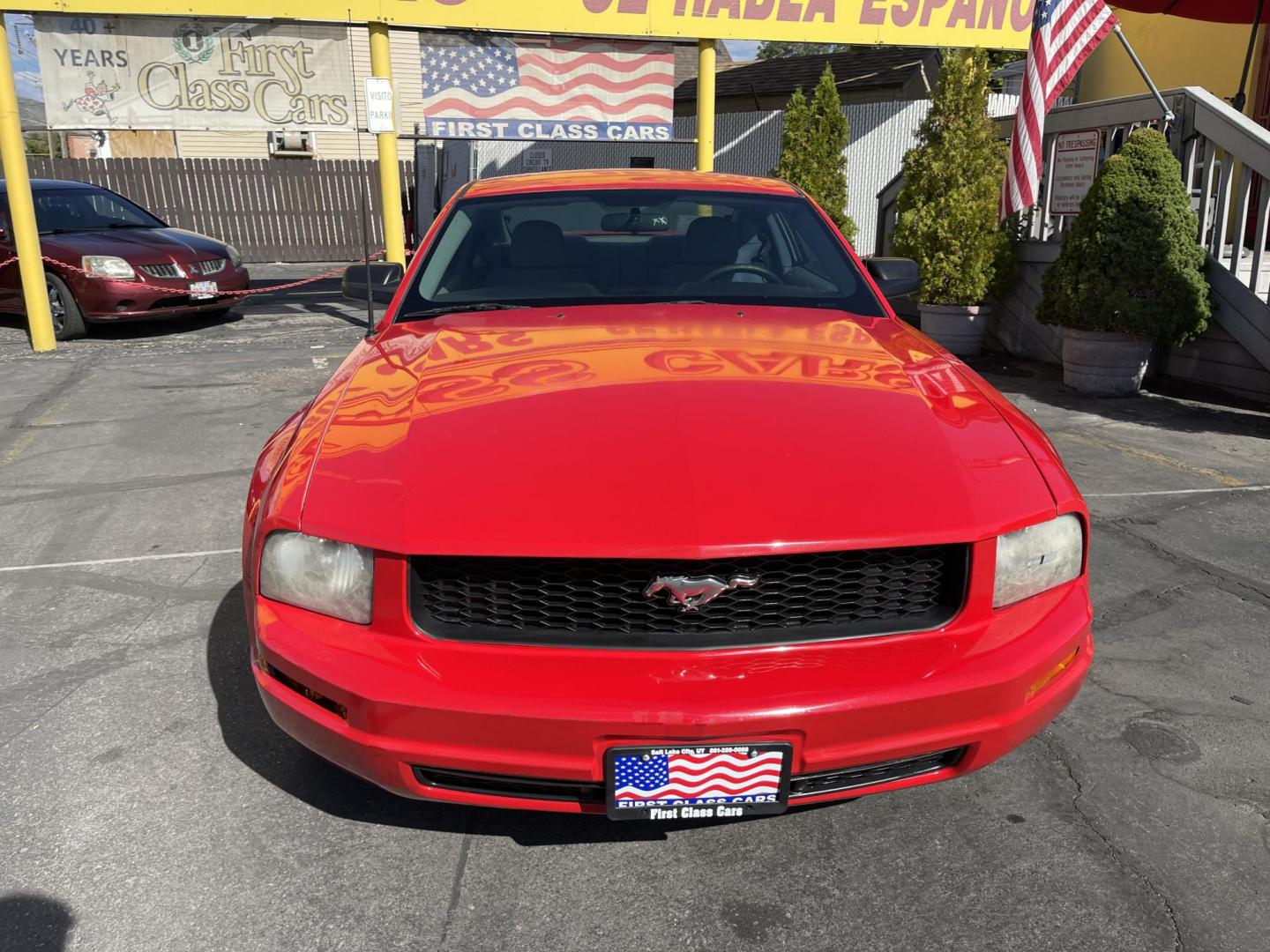 2009 Sport Red Metallic /Gray Ford Mustang V6 Coupe (1ZVHT80N895) with an 4.0L V6 SOHC 12V engine, AUTOMATIC transmission, located at 801 South State Street, Salt Lake City, UT, 84111, (801) 328-0098, 40.751953, -111.888206 - Clean title! Approved for up to a 5 year warranty! Has been checked out by our service center and passed emissions already and been approved for up to a 5 year warranty that can be purchased. Features: ABS Brakes, Air Conditioning, Alloy Wheels, AM/FM Stereo, Automatic Transmission, Auxiliary Audi - Photo#3