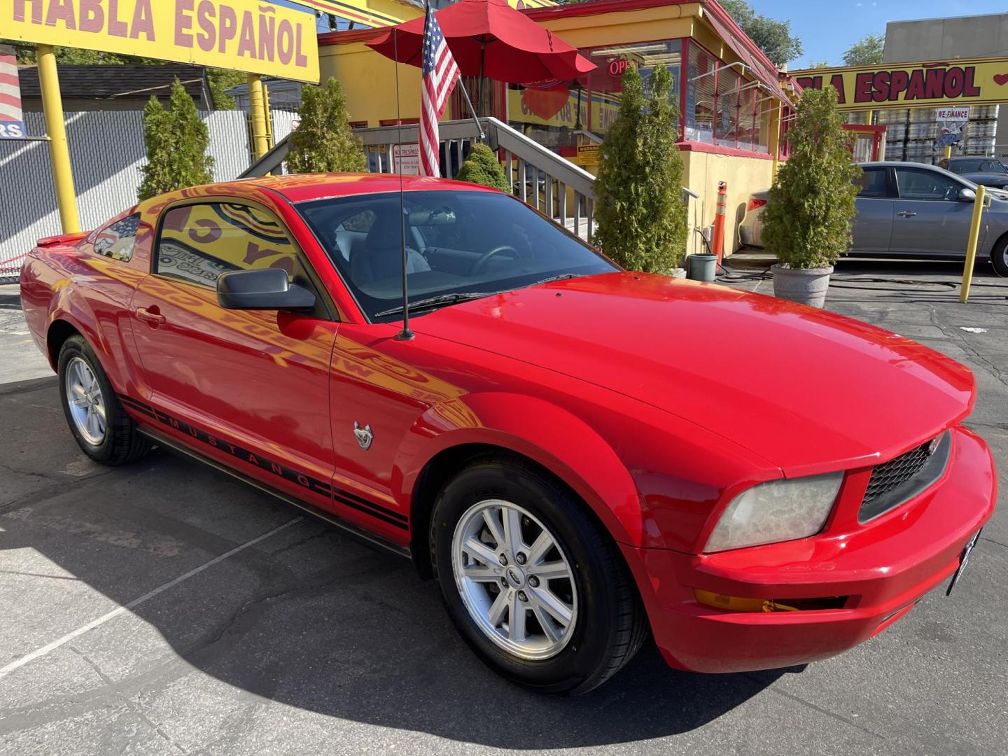2009 Sport Red Metallic /Gray Ford Mustang V6 Coupe (1ZVHT80N895) with an 4.0L V6 SOHC 12V engine, AUTOMATIC transmission, located at 801 South State Street, Salt Lake City, UT, 84111, (801) 328-0098, 40.751953, -111.888206 - Clean title! Approved for up to a 5 year warranty! Has been checked out by our service center and passed emissions already and been approved for up to a 5 year warranty that can be purchased. Features: ABS Brakes, Air Conditioning, Alloy Wheels, AM/FM Stereo, Automatic Transmission, Auxiliary Audi - Photo#4