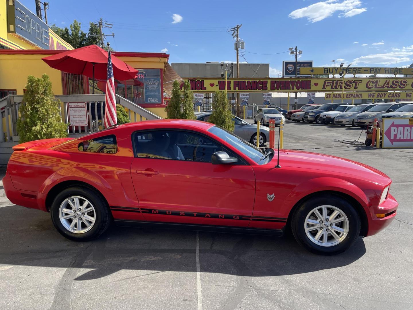 2009 Sport Red Metallic /Gray Ford Mustang V6 Coupe (1ZVHT80N895) with an 4.0L V6 SOHC 12V engine, AUTOMATIC transmission, located at 801 South State Street, Salt Lake City, UT, 84111, (801) 328-0098, 40.751953, -111.888206 - Clean title! Approved for up to a 5 year warranty! Has been checked out by our service center and passed emissions already and been approved for up to a 5 year warranty that can be purchased. Features: ABS Brakes, Air Conditioning, Alloy Wheels, AM/FM Stereo, Automatic Transmission, Auxiliary Audi - Photo#5