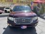 2013 Maroon /Tan Honda Ridgeline RTL w/ Leather and Navigation (5FPYK1F53DB) with an 3.5L V6 SOHC 24V engine, 5-Speed Automatic transmission, located at 801 South State Street, Salt Lake City, UT, 84111, (801) 328-0098, 40.751953, -111.888206 - Clean title! 4x4 in great condition! Bed liner is brand new and looks great we had a new bed liner installed! Truck has been through our mechanic shop and passed emissions already and approved for up to a 3 month to 5 year warranty that can be purchased! Very nice truck for anyone looking for a Ridg - Photo#3