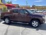 2013 Maroon /Tan Honda Ridgeline RTL w/ Leather and Navigation (5FPYK1F53DB) with an 3.5L V6 SOHC 24V engine, 5-Speed Automatic transmission, located at 801 South State Street, Salt Lake City, UT, 84111, (801) 328-0098, 40.751953, -111.888206 - Clean title! 4x4 in great condition! Bed liner is brand new and looks great we had a new bed liner installed! Truck has been through our mechanic shop and passed emissions already and approved for up to a 3 month to 5 year warranty that can be purchased! Very nice truck for anyone looking for a Ridg - Photo#5
