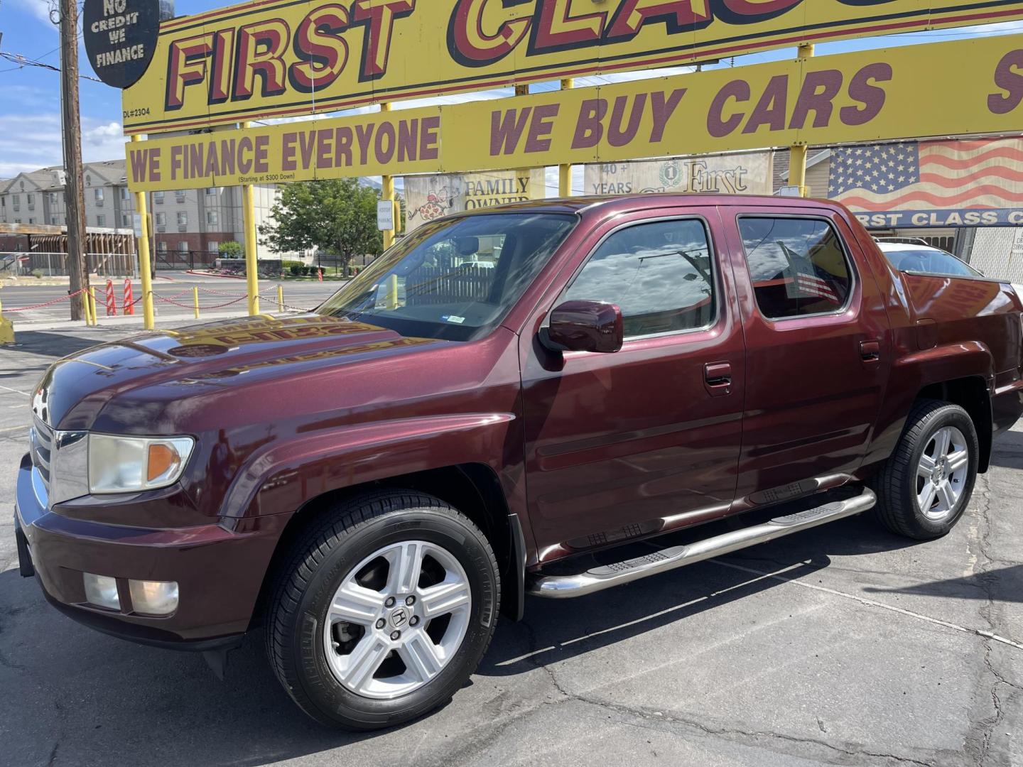2013 Maroon /Tan Honda Ridgeline RTL w/ Leather and Navigation (5FPYK1F53DB) with an 3.5L V6 SOHC 24V engine, 5-Speed Automatic transmission, located at 801 South State Street, Salt Lake City, UT, 84111, (801) 328-0098, 40.751953, -111.888206 - Clean title! 4x4 in great condition! Bed liner is brand new and looks great we had a new bed liner installed! Truck has been through our mechanic shop and passed emissions already and approved for up to a 3 month to 5 year warranty that can be purchased! Very nice truck for anyone looking for a Ridg - Photo#11