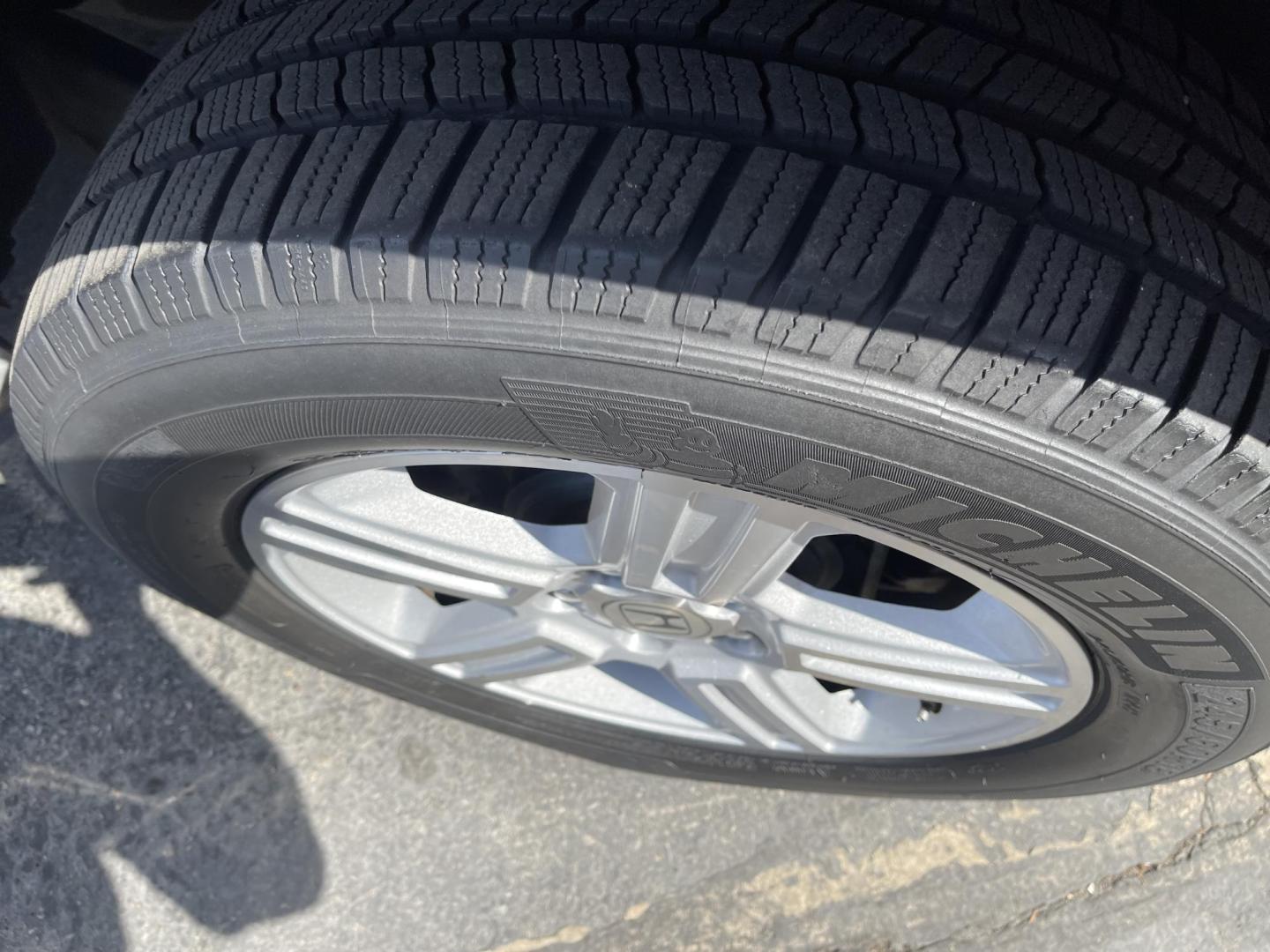 2013 Maroon /Tan Honda Ridgeline RTL w/ Leather and Navigation (5FPYK1F53DB) with an 3.5L V6 SOHC 24V engine, 5-Speed Automatic transmission, located at 801 South State Street, Salt Lake City, UT, 84111, (801) 328-0098, 40.751953, -111.888206 - Clean title! 4x4 in great condition! Bed liner is brand new and looks great we had a new bed liner installed! Truck has been through our mechanic shop and passed emissions already and approved for up to a 3 month to 5 year warranty that can be purchased! Very nice truck for anyone looking for a Ridg - Photo#13