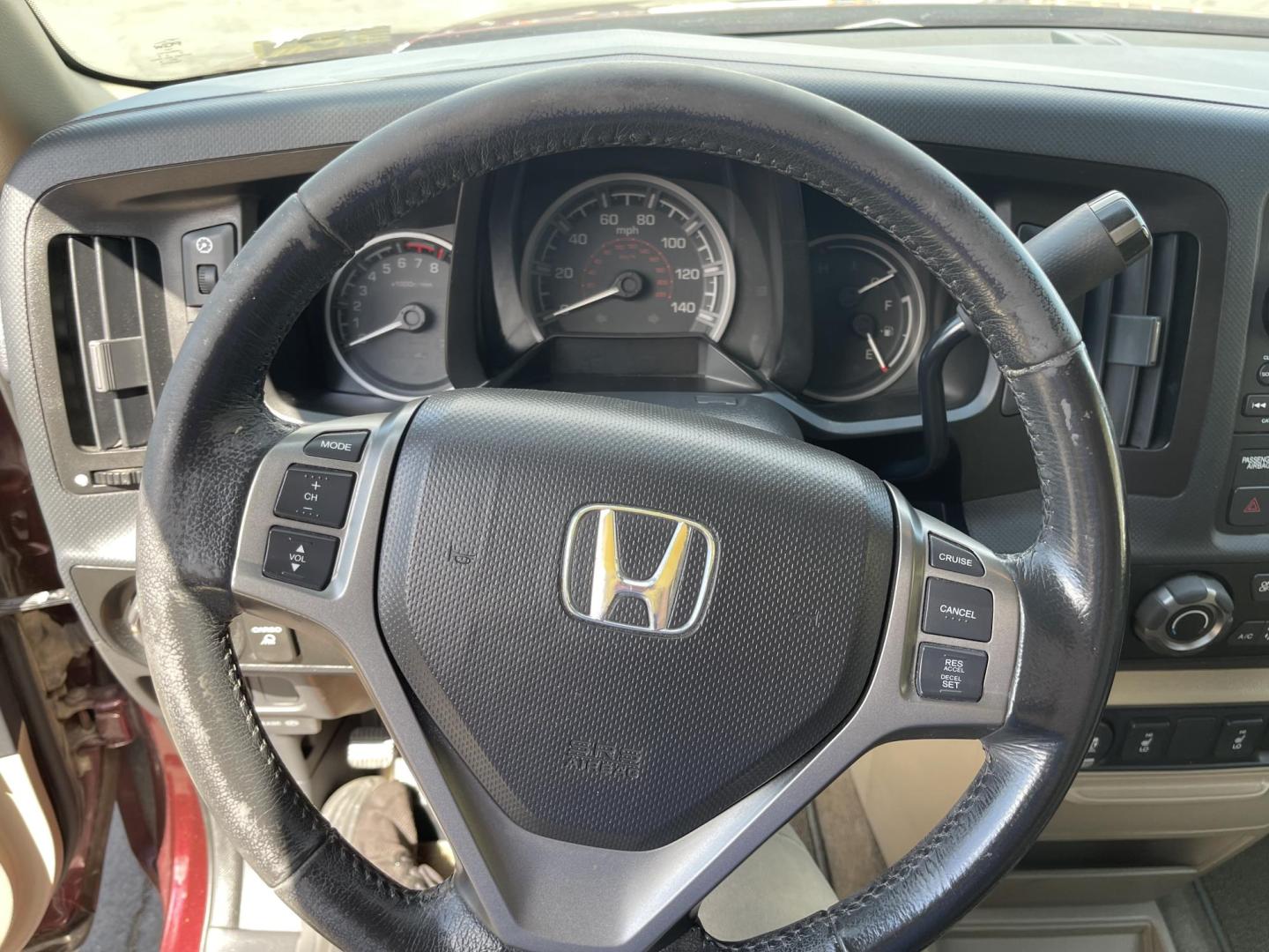 2013 Maroon /Tan Honda Ridgeline RTL w/ Leather and Navigation (5FPYK1F53DB) with an 3.5L V6 SOHC 24V engine, 5-Speed Automatic transmission, located at 801 South State Street, Salt Lake City, UT, 84111, (801) 328-0098, 40.751953, -111.888206 - Clean title! 4x4 in great condition! Bed liner is brand new and looks great we had a new bed liner installed! Truck has been through our mechanic shop and passed emissions already and approved for up to a 3 month to 5 year warranty that can be purchased! Very nice truck for anyone looking for a Ridg - Photo#19