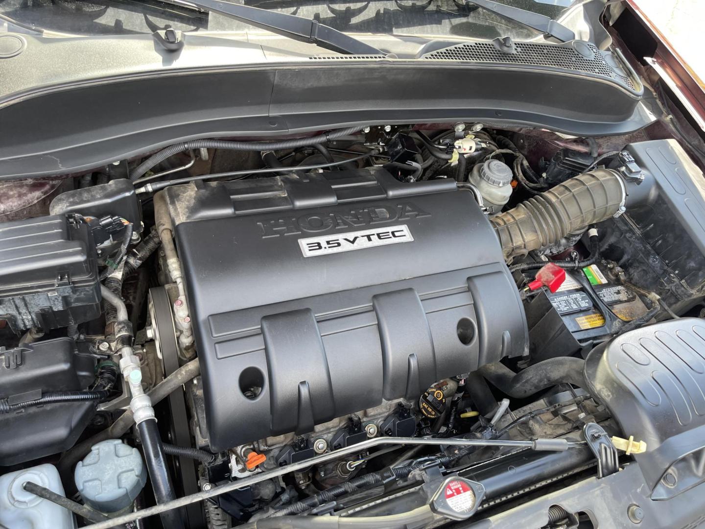 2013 Maroon /Tan Honda Ridgeline RTL w/ Leather and Navigation (5FPYK1F53DB) with an 3.5L V6 SOHC 24V engine, 5-Speed Automatic transmission, located at 801 South State Street, Salt Lake City, UT, 84111, (801) 328-0098, 40.751953, -111.888206 - Clean title! 4x4 in great condition! Bed liner is brand new and looks great we had a new bed liner installed! Truck has been through our mechanic shop and passed emissions already and approved for up to a 3 month to 5 year warranty that can be purchased! Very nice truck for anyone looking for a Ridg - Photo#28