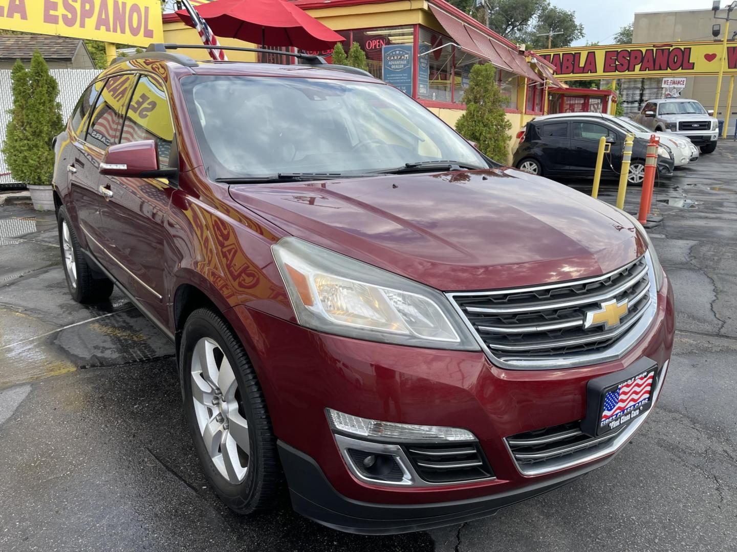 2015 Maroon /Black Chevrolet Traverse LTZ AWD (1GNKVJKD0FJ) with an 3.6L V6 DOHC 24V engine, 6-Speed Automatic transmission, located at 801 South State Street, Salt Lake City, UT, 84111, (801) 328-0098, 40.751953, -111.888206 - AWD, Clean title!!! Must see in great condition for the year, make and miles! Comes with all wheel drive and is loaded with lots of adds. Equipped with rear entertainment and rear a/c ventilation, 3rd row seating for the family great family vehicle! Heated and A/C seats! Vehicle has been inspected b - Photo#3