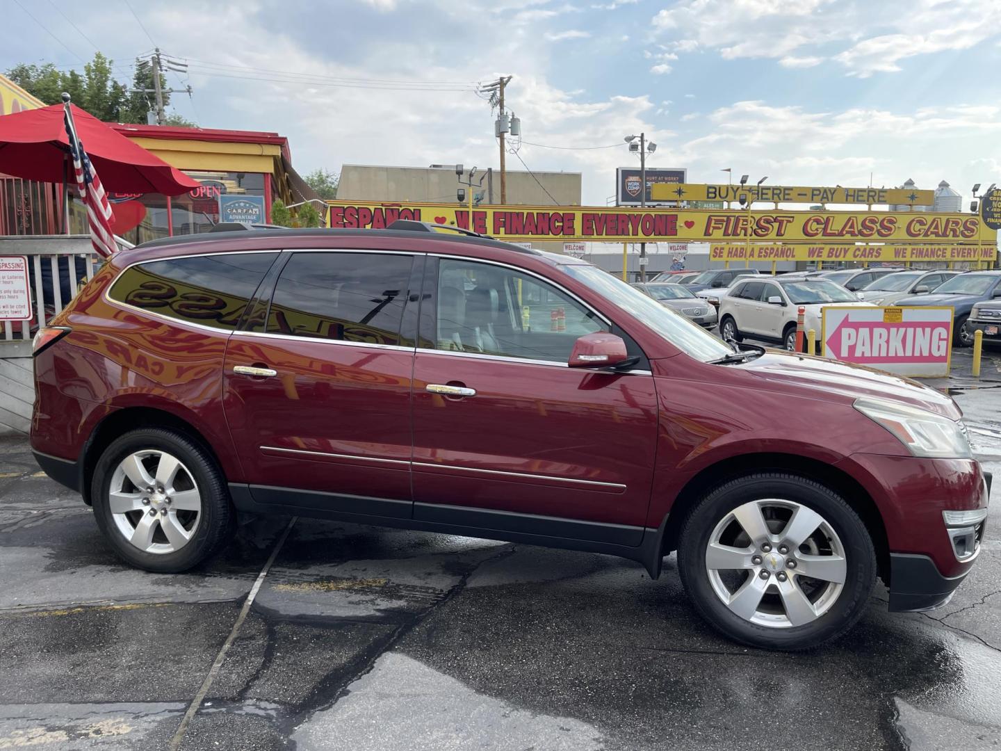 2015 Maroon /Black Chevrolet Traverse LTZ AWD (1GNKVJKD0FJ) with an 3.6L V6 DOHC 24V engine, 6-Speed Automatic transmission, located at 801 South State Street, Salt Lake City, UT, 84111, (801) 328-0098, 40.751953, -111.888206 - AWD, Clean title!!! Must see in great condition for the year, make and miles! Comes with all wheel drive and is loaded with lots of adds. Equipped with rear entertainment and rear a/c ventilation, 3rd row seating for the family great family vehicle! Heated and A/C seats! Vehicle has been inspected b - Photo#4