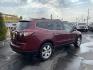 2015 Maroon /Black Chevrolet Traverse LTZ AWD (1GNKVJKD0FJ) with an 3.6L V6 DOHC 24V engine, 6-Speed Automatic transmission, located at 801 South State Street, Salt Lake City, UT, 84111, (801) 328-0098, 40.751953, -111.888206 - AWD, Clean title!!! Must see in great condition for the year, make and miles! Comes with all wheel drive and is loaded with lots of adds. Equipped with rear entertainment and rear a/c ventilation, 3rd row seating for the family great family vehicle! Heated and A/C seats! Vehicle has been inspected b - Photo#5