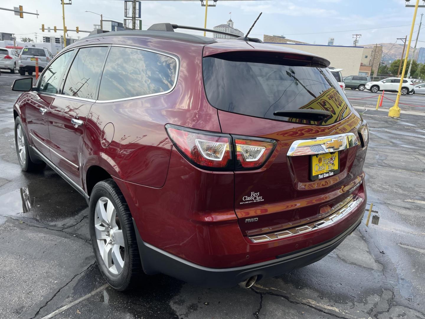 2015 Maroon /Black Chevrolet Traverse LTZ AWD (1GNKVJKD0FJ) with an 3.6L V6 DOHC 24V engine, 6-Speed Automatic transmission, located at 801 South State Street, Salt Lake City, UT, 84111, (801) 328-0098, 40.751953, -111.888206 - AWD, Clean title!!! Must see in great condition for the year, make and miles! Comes with all wheel drive and is loaded with lots of adds. Equipped with rear entertainment and rear a/c ventilation, 3rd row seating for the family great family vehicle! Heated and A/C seats! Vehicle has been inspected b - Photo#7