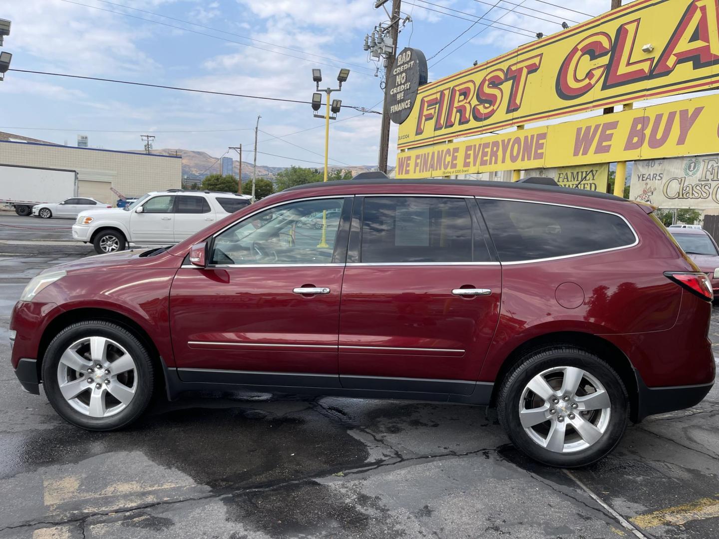 2015 Maroon /Black Chevrolet Traverse LTZ AWD (1GNKVJKD0FJ) with an 3.6L V6 DOHC 24V engine, 6-Speed Automatic transmission, located at 801 South State Street, Salt Lake City, UT, 84111, (801) 328-0098, 40.751953, -111.888206 - AWD, Clean title!!! Must see in great condition for the year, make and miles! Comes with all wheel drive and is loaded with lots of adds. Equipped with rear entertainment and rear a/c ventilation, 3rd row seating for the family great family vehicle! Heated and A/C seats! Vehicle has been inspected b - Photo#8