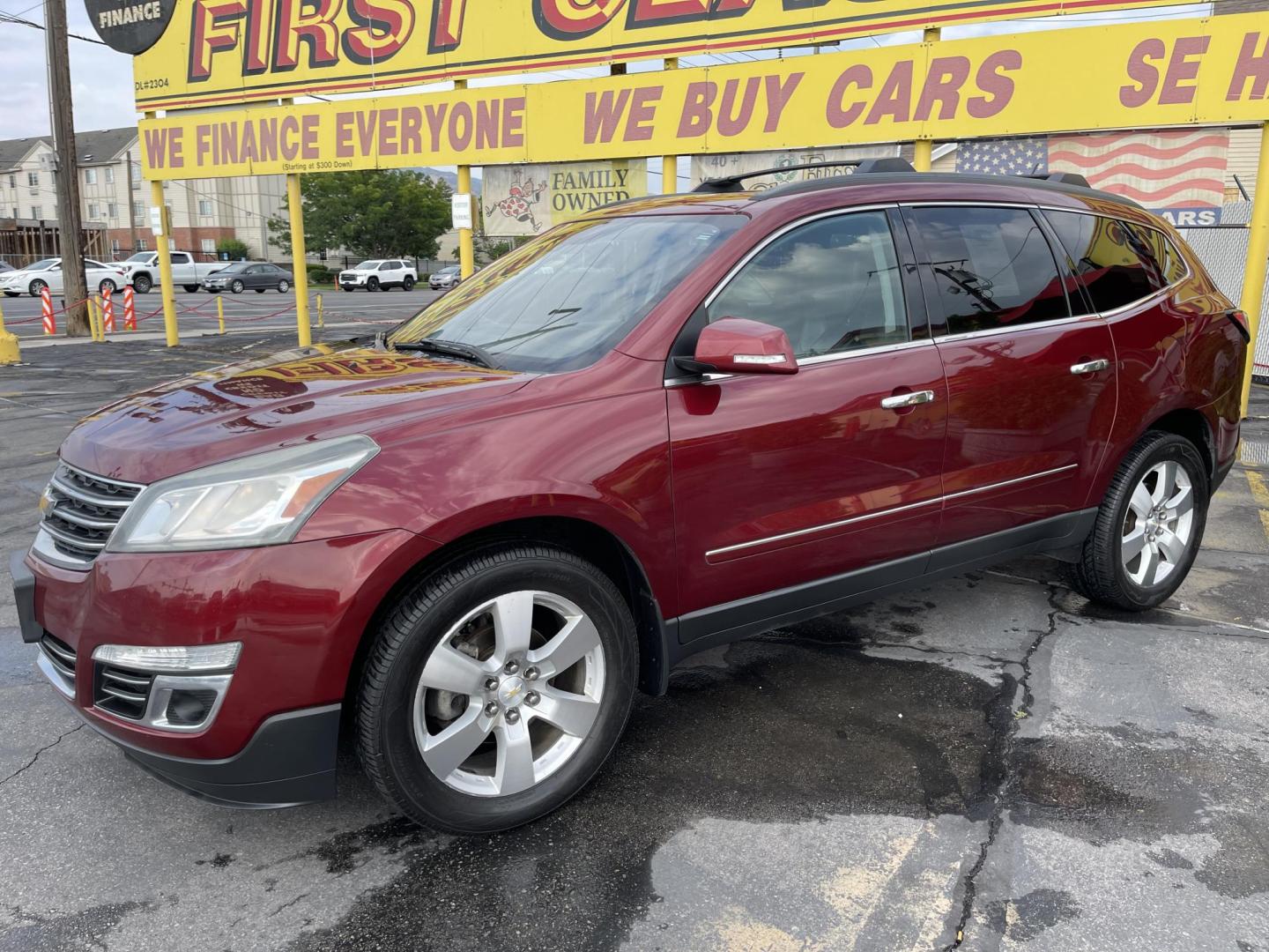 2015 Maroon /Black Chevrolet Traverse LTZ AWD (1GNKVJKD0FJ) with an 3.6L V6 DOHC 24V engine, 6-Speed Automatic transmission, located at 801 South State Street, Salt Lake City, UT, 84111, (801) 328-0098, 40.751953, -111.888206 - AWD, Clean title!!! Must see in great condition for the year, make and miles! Comes with all wheel drive and is loaded with lots of adds. Equipped with rear entertainment and rear a/c ventilation, 3rd row seating for the family great family vehicle! Heated and A/C seats! Vehicle has been inspected b - Photo#9