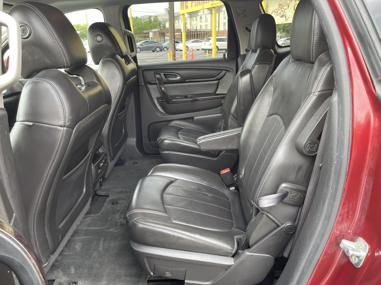 2015 Maroon /Black Chevrolet Traverse LTZ AWD (1GNKVJKD0FJ) with an 3.6L V6 DOHC 24V engine, 6-Speed Automatic transmission, located at 801 South State Street, Salt Lake City, UT, 84111, (801) 328-0098, 40.751953, -111.888206 - AWD, Clean title!!! Must see in great condition for the year, make and miles! Comes with all wheel drive and is loaded with lots of adds. Equipped with rear entertainment and rear a/c ventilation, 3rd row seating for the family great family vehicle! Heated and A/C seats! Vehicle has been inspected b - Photo#13