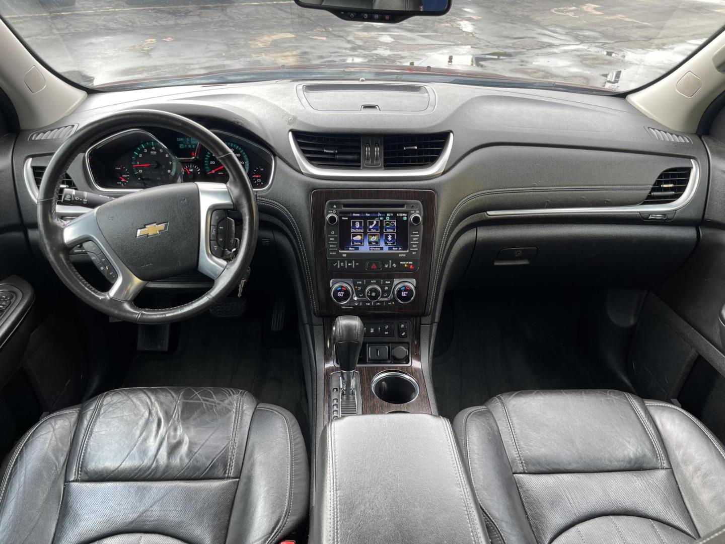 2015 Maroon /Black Chevrolet Traverse LTZ AWD (1GNKVJKD0FJ) with an 3.6L V6 DOHC 24V engine, 6-Speed Automatic transmission, located at 801 South State Street, Salt Lake City, UT, 84111, (801) 328-0098, 40.751953, -111.888206 - AWD, Clean title!!! Must see in great condition for the year, make and miles! Comes with all wheel drive and is loaded with lots of adds. Equipped with rear entertainment and rear a/c ventilation, 3rd row seating for the family great family vehicle! Heated and A/C seats! Vehicle has been inspected b - Photo#14