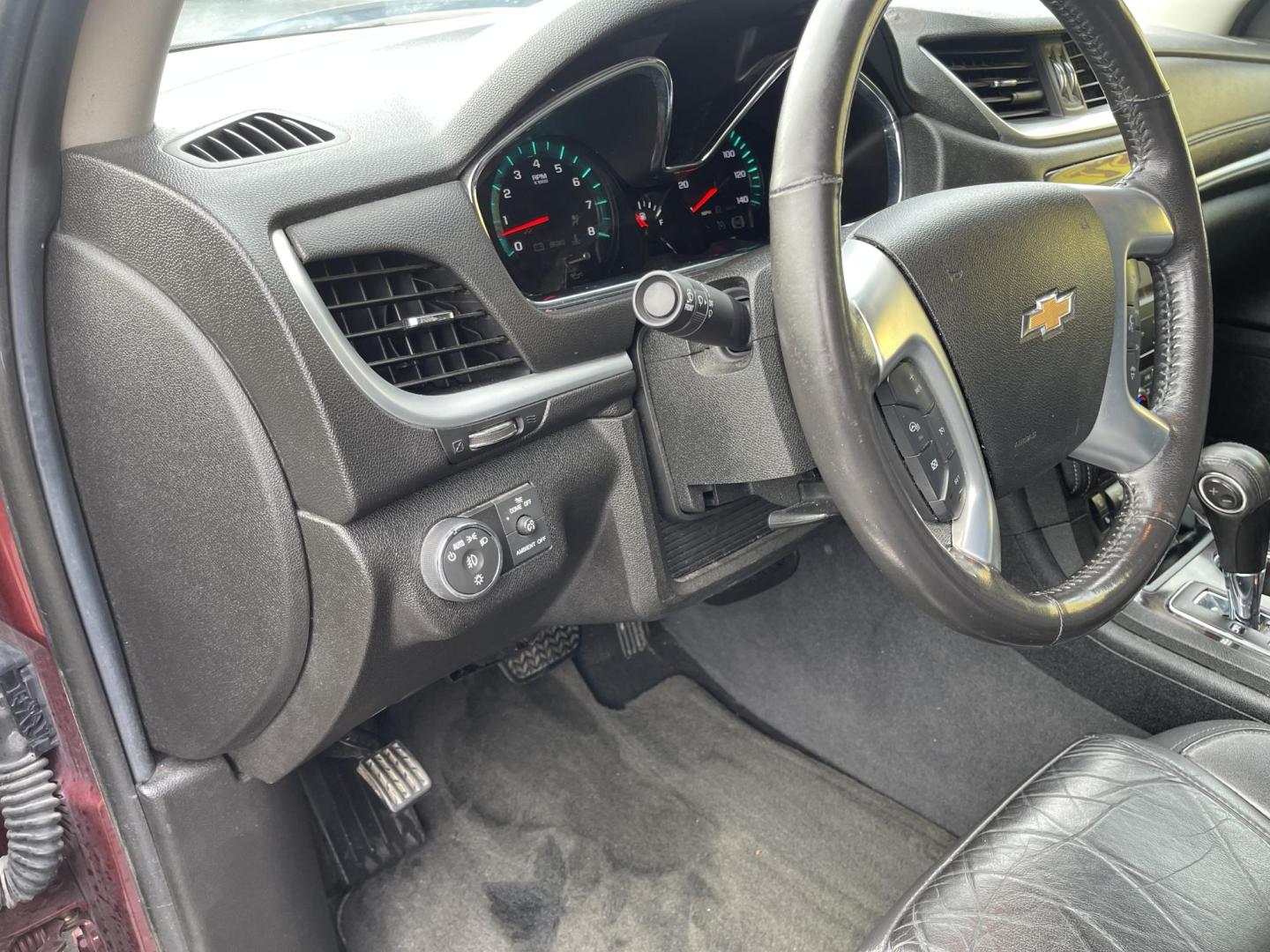 2015 Maroon /Black Chevrolet Traverse LTZ AWD (1GNKVJKD0FJ) with an 3.6L V6 DOHC 24V engine, 6-Speed Automatic transmission, located at 801 South State Street, Salt Lake City, UT, 84111, (801) 328-0098, 40.751953, -111.888206 - AWD, Clean title!!! Must see in great condition for the year, make and miles! Comes with all wheel drive and is loaded with lots of adds. Equipped with rear entertainment and rear a/c ventilation, 3rd row seating for the family great family vehicle! Heated and A/C seats! Vehicle has been inspected b - Photo#22