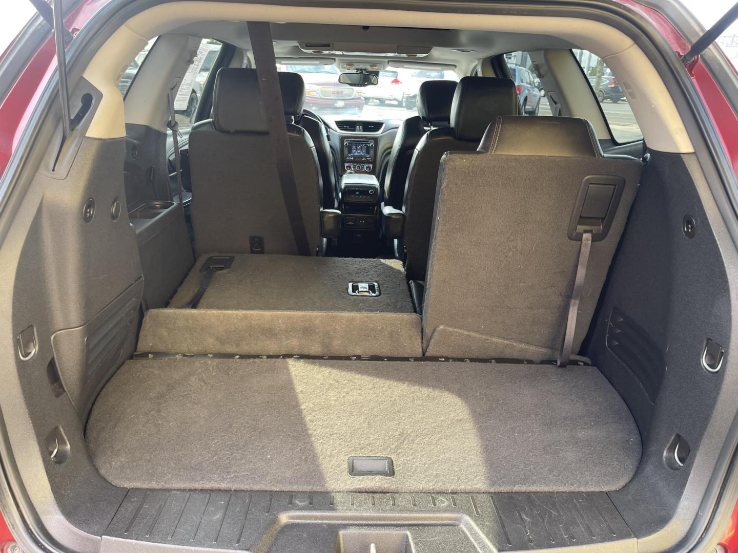 2015 Maroon /Black Chevrolet Traverse LTZ AWD (1GNKVJKD0FJ) with an 3.6L V6 DOHC 24V engine, 6-Speed Automatic transmission, located at 801 South State Street, Salt Lake City, UT, 84111, (801) 328-0098, 40.751953, -111.888206 - AWD, Clean title!!! Must see in great condition for the year, make and miles! Comes with all wheel drive and is loaded with lots of adds. Equipped with rear entertainment and rear a/c ventilation, 3rd row seating for the family great family vehicle! Heated and A/C seats! Vehicle has been inspected b - Photo#26