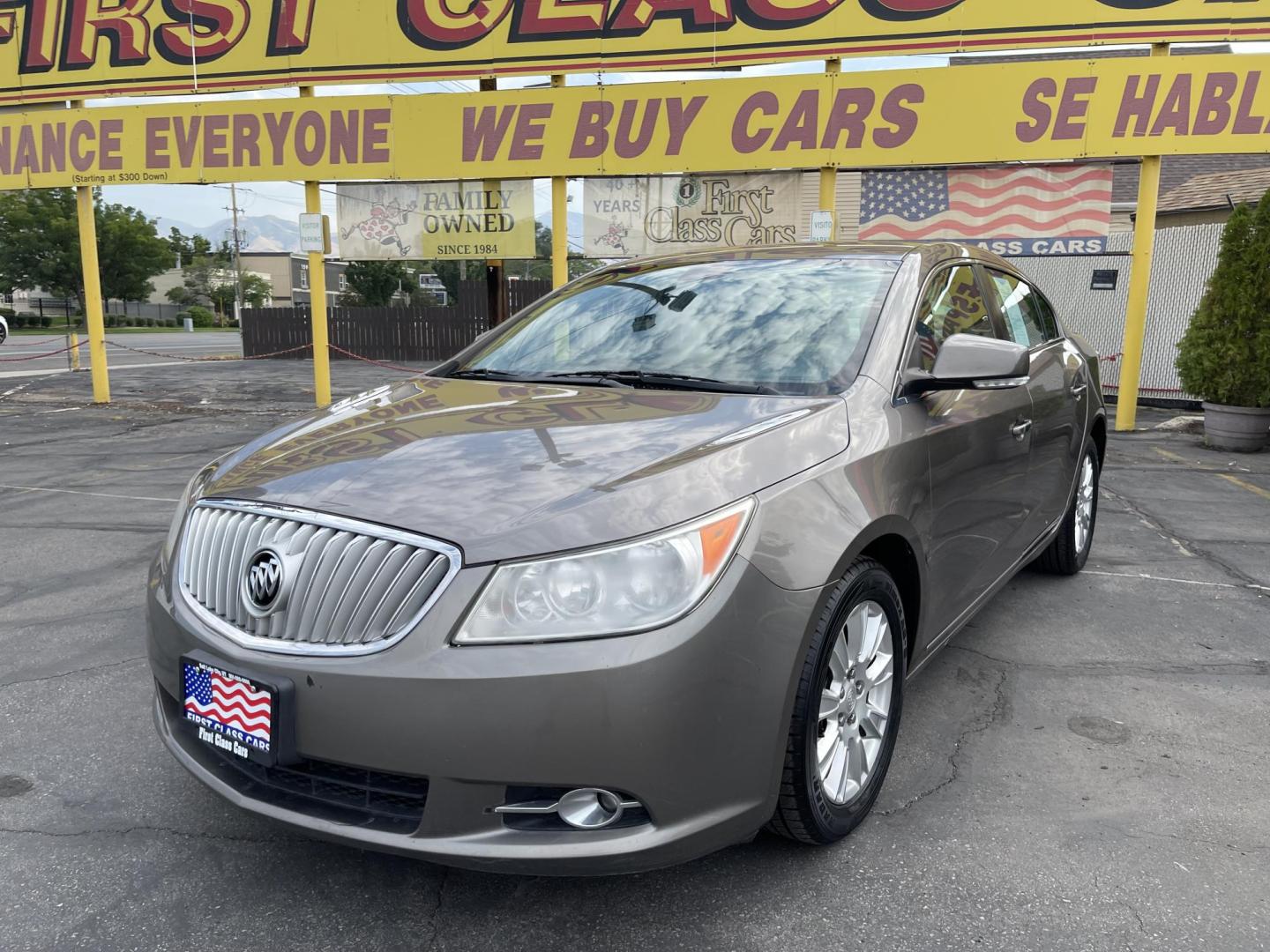 2012 Silver Sky Metallic /Tan Buick LaCrosse Leather Package (1G4GC5ER8CF) with an 2.4L L4 DOHC 16V engine, 6-Speed Automatic transmission, located at 801 South State Street, Salt Lake City, UT, 84111, (801) 328-0098, 40.751953, -111.888206 - Clean title! No accidents on Carfax! Service history is shown on the Carfax report. Super clean inside and out! Immaculate condition! Passed emissions already and has been checked out by our mechanic shop and approved for up to a 5 year warranty. Features: ABS Brakes, Air Conditioning, Alloy Wheels - Photo#1