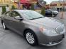 2012 Silver Sky Metallic /Tan Buick LaCrosse Leather Package (1G4GC5ER8CF) with an 2.4L L4 DOHC 16V engine, 6-Speed Automatic transmission, located at 801 South State Street, Salt Lake City, UT, 84111, (801) 328-0098, 40.751953, -111.888206 - Clean title! No accidents on Carfax! Service history is shown on the Carfax report. Super clean inside and out! Immaculate condition! Passed emissions already and has been checked out by our mechanic shop and approved for up to a 5 year warranty. Features: ABS Brakes, Air Conditioning, Alloy Wheels - Photo#3