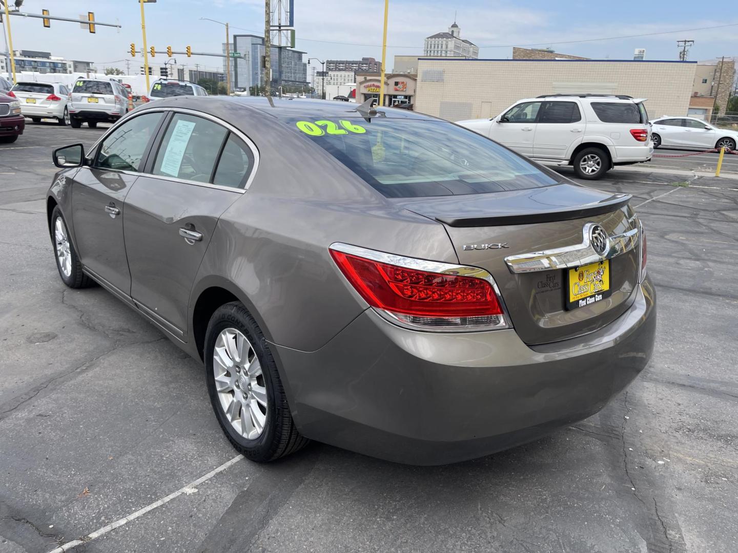 2012 Silver Sky Metallic /Tan Buick LaCrosse Leather Package (1G4GC5ER8CF) with an 2.4L L4 DOHC 16V engine, 6-Speed Automatic transmission, located at 801 South State Street, Salt Lake City, UT, 84111, (801) 328-0098, 40.751953, -111.888206 - Clean title! No accidents on Carfax! Service history is shown on the Carfax report. Super clean inside and out! Immaculate condition! Passed emissions already and has been checked out by our mechanic shop and approved for up to a 5 year warranty. Features: ABS Brakes, Air Conditioning, Alloy Wheels - Photo#7