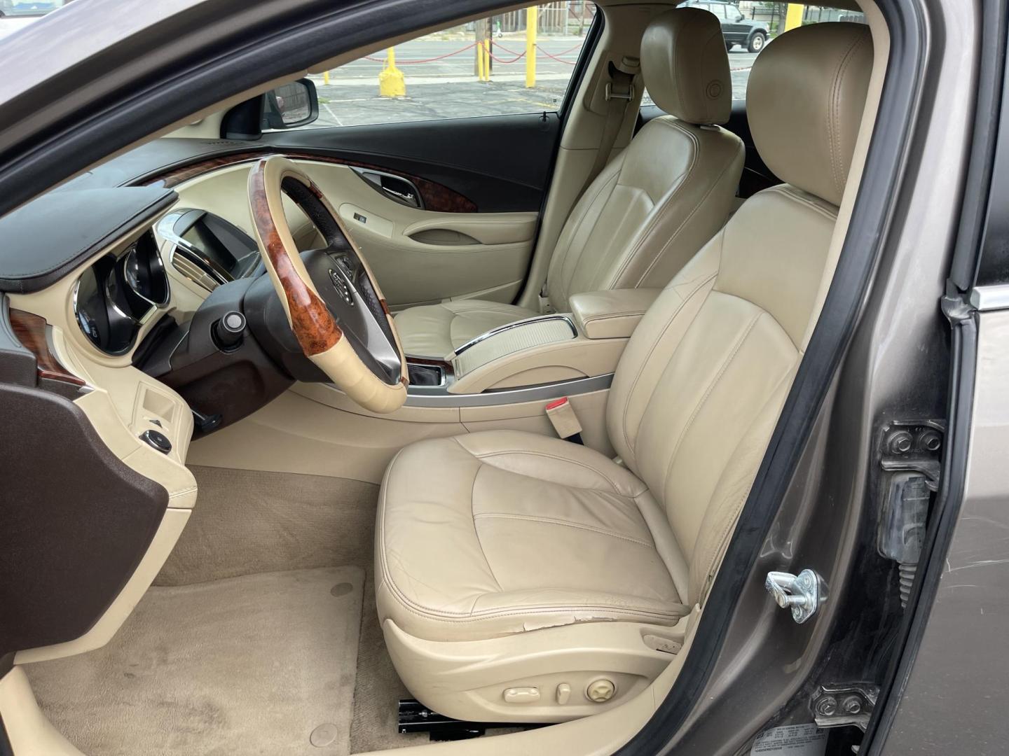 2012 Silver Sky Metallic /Tan Buick LaCrosse Leather Package (1G4GC5ER8CF) with an 2.4L L4 DOHC 16V engine, 6-Speed Automatic transmission, located at 801 South State Street, Salt Lake City, UT, 84111, (801) 328-0098, 40.751953, -111.888206 - Clean title! No accidents on Carfax! Service history is shown on the Carfax report. Super clean inside and out! Immaculate condition! Passed emissions already and has been checked out by our mechanic shop and approved for up to a 5 year warranty. Features: ABS Brakes, Air Conditioning, Alloy Wheels - Photo#11