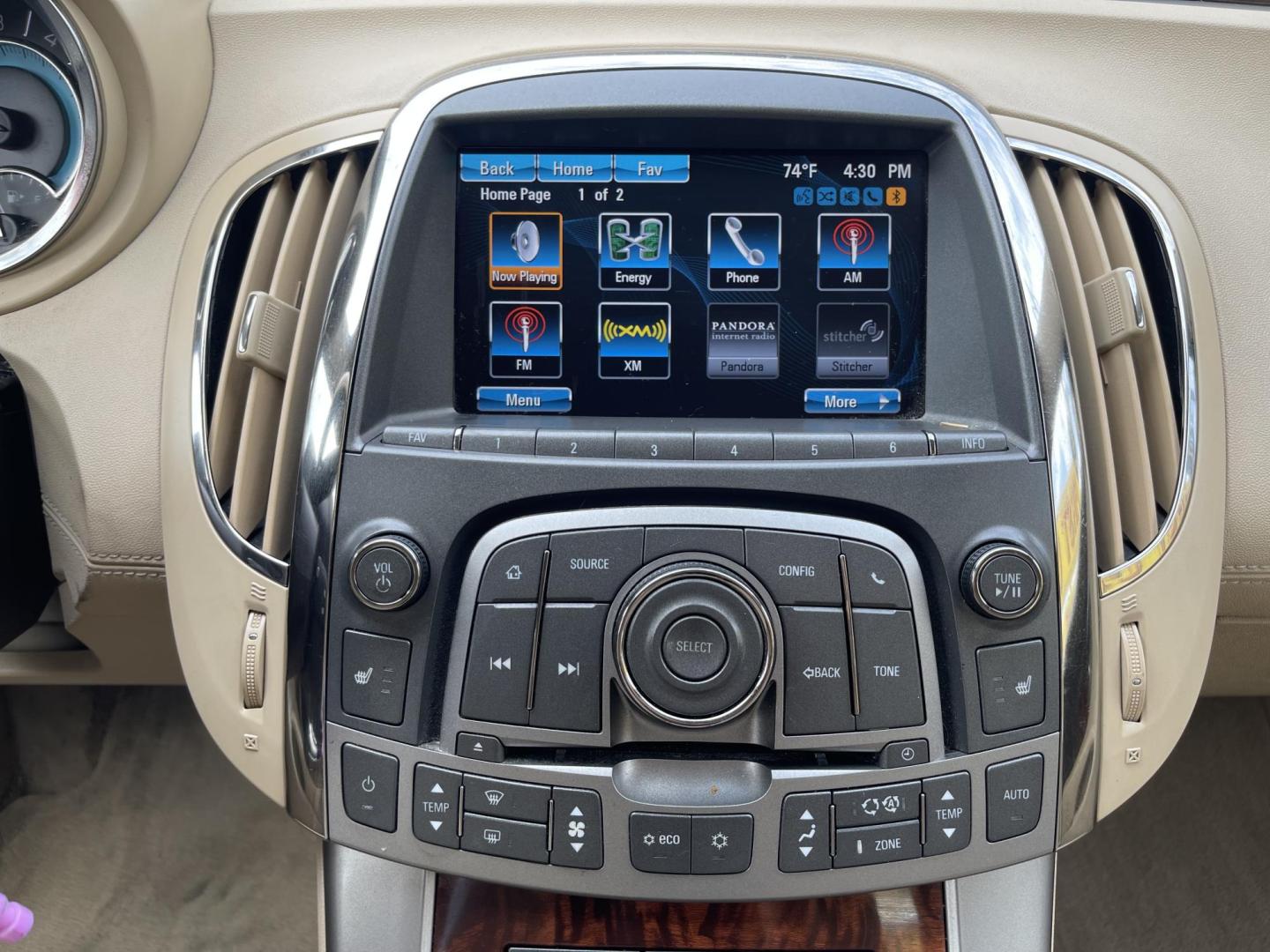 2012 Silver Sky Metallic /Tan Buick LaCrosse Leather Package (1G4GC5ER8CF) with an 2.4L L4 DOHC 16V engine, 6-Speed Automatic transmission, located at 801 South State Street, Salt Lake City, UT, 84111, (801) 328-0098, 40.751953, -111.888206 - Clean title! No accidents on Carfax! Service history is shown on the Carfax report. Super clean inside and out! Immaculate condition! Passed emissions already and has been checked out by our mechanic shop and approved for up to a 5 year warranty. Features: ABS Brakes, Air Conditioning, Alloy Wheels - Photo#14