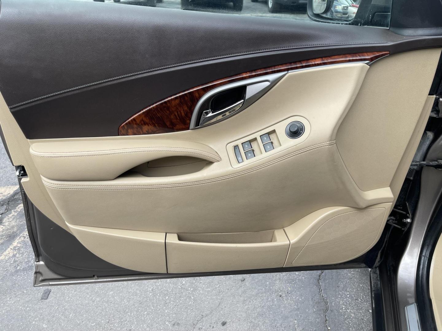 2012 Silver Sky Metallic /Tan Buick LaCrosse Leather Package (1G4GC5ER8CF) with an 2.4L L4 DOHC 16V engine, 6-Speed Automatic transmission, located at 801 South State Street, Salt Lake City, UT, 84111, (801) 328-0098, 40.751953, -111.888206 - Clean title! No accidents on Carfax! Service history is shown on the Carfax report. Super clean inside and out! Immaculate condition! Passed emissions already and has been checked out by our mechanic shop and approved for up to a 5 year warranty. Features: ABS Brakes, Air Conditioning, Alloy Wheels - Photo#16
