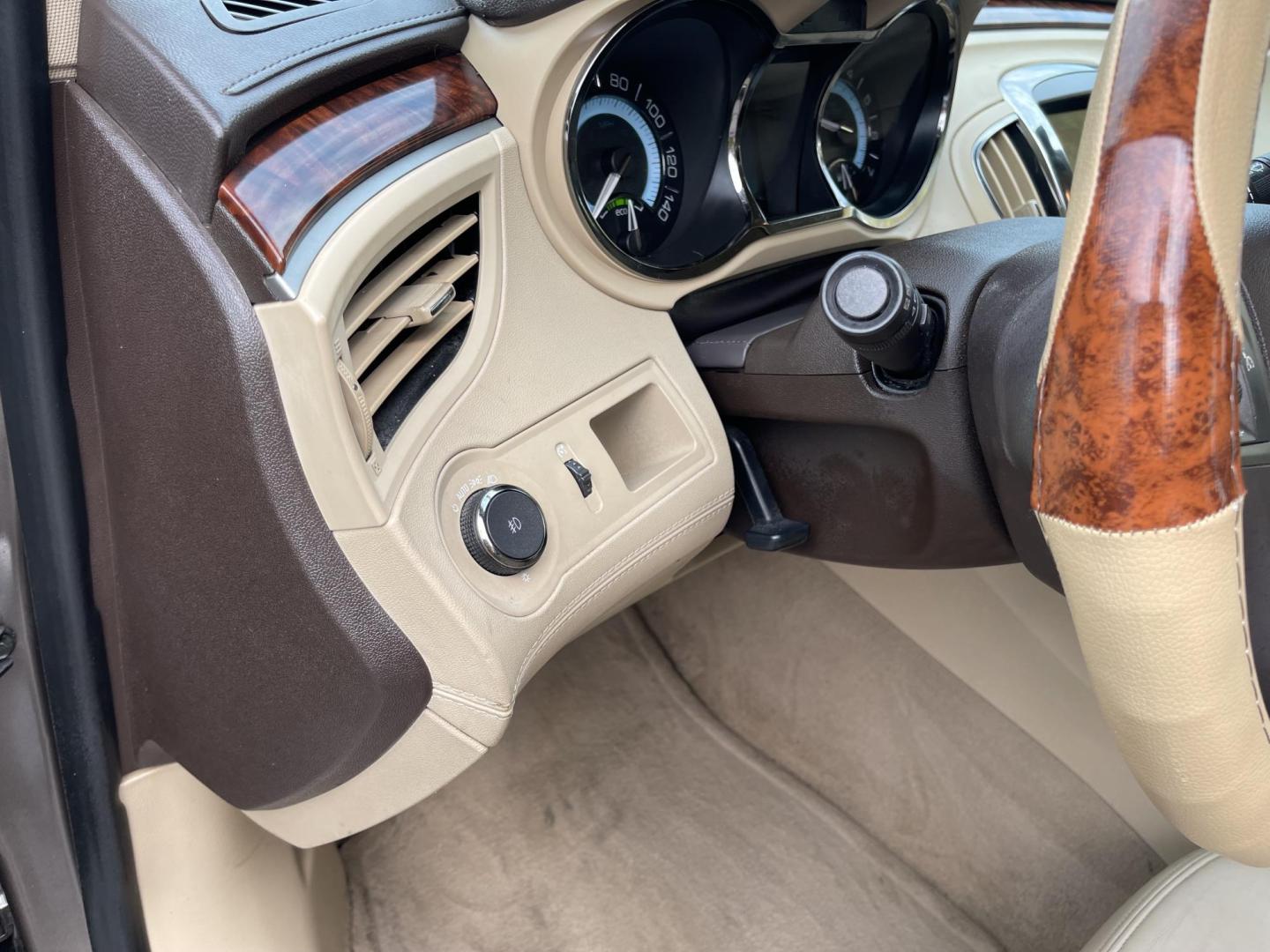2012 Silver Sky Metallic /Tan Buick LaCrosse Leather Package (1G4GC5ER8CF) with an 2.4L L4 DOHC 16V engine, 6-Speed Automatic transmission, located at 801 South State Street, Salt Lake City, UT, 84111, (801) 328-0098, 40.751953, -111.888206 - Clean title! No accidents on Carfax! Service history is shown on the Carfax report. Super clean inside and out! Immaculate condition! Passed emissions already and has been checked out by our mechanic shop and approved for up to a 5 year warranty. Features: ABS Brakes, Air Conditioning, Alloy Wheels - Photo#20