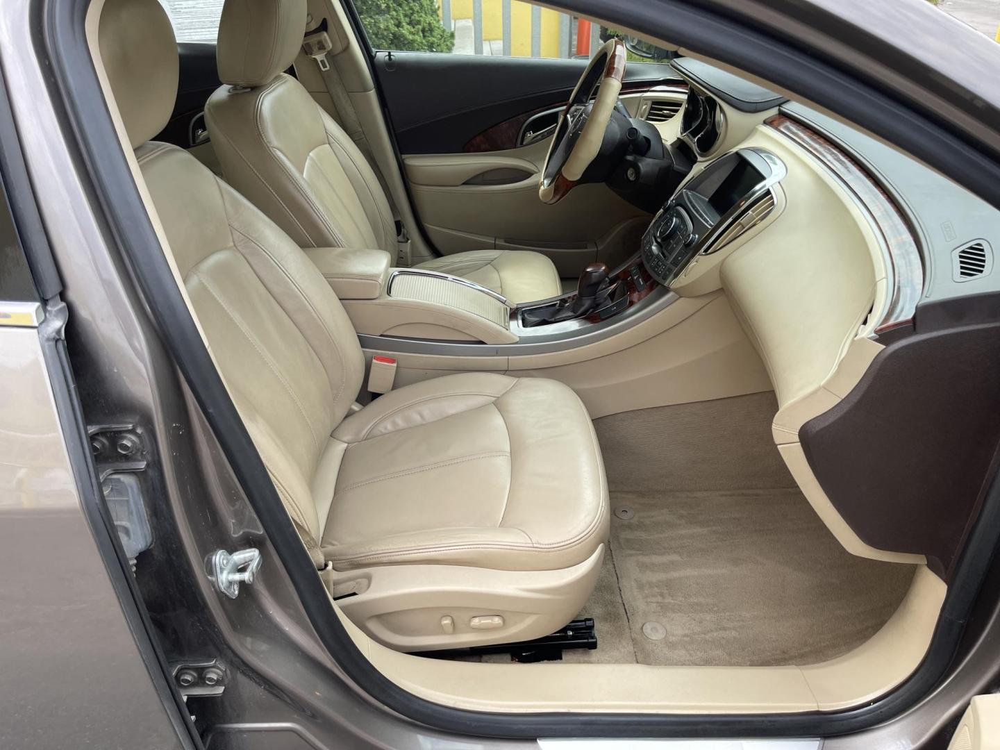 2012 Silver Sky Metallic /Tan Buick LaCrosse Leather Package (1G4GC5ER8CF) with an 2.4L L4 DOHC 16V engine, 6-Speed Automatic transmission, located at 801 South State Street, Salt Lake City, UT, 84111, (801) 328-0098, 40.751953, -111.888206 - Clean title! No accidents on Carfax! Service history is shown on the Carfax report. Super clean inside and out! Immaculate condition! Passed emissions already and has been checked out by our mechanic shop and approved for up to a 5 year warranty. Features: ABS Brakes, Air Conditioning, Alloy Wheels - Photo#28