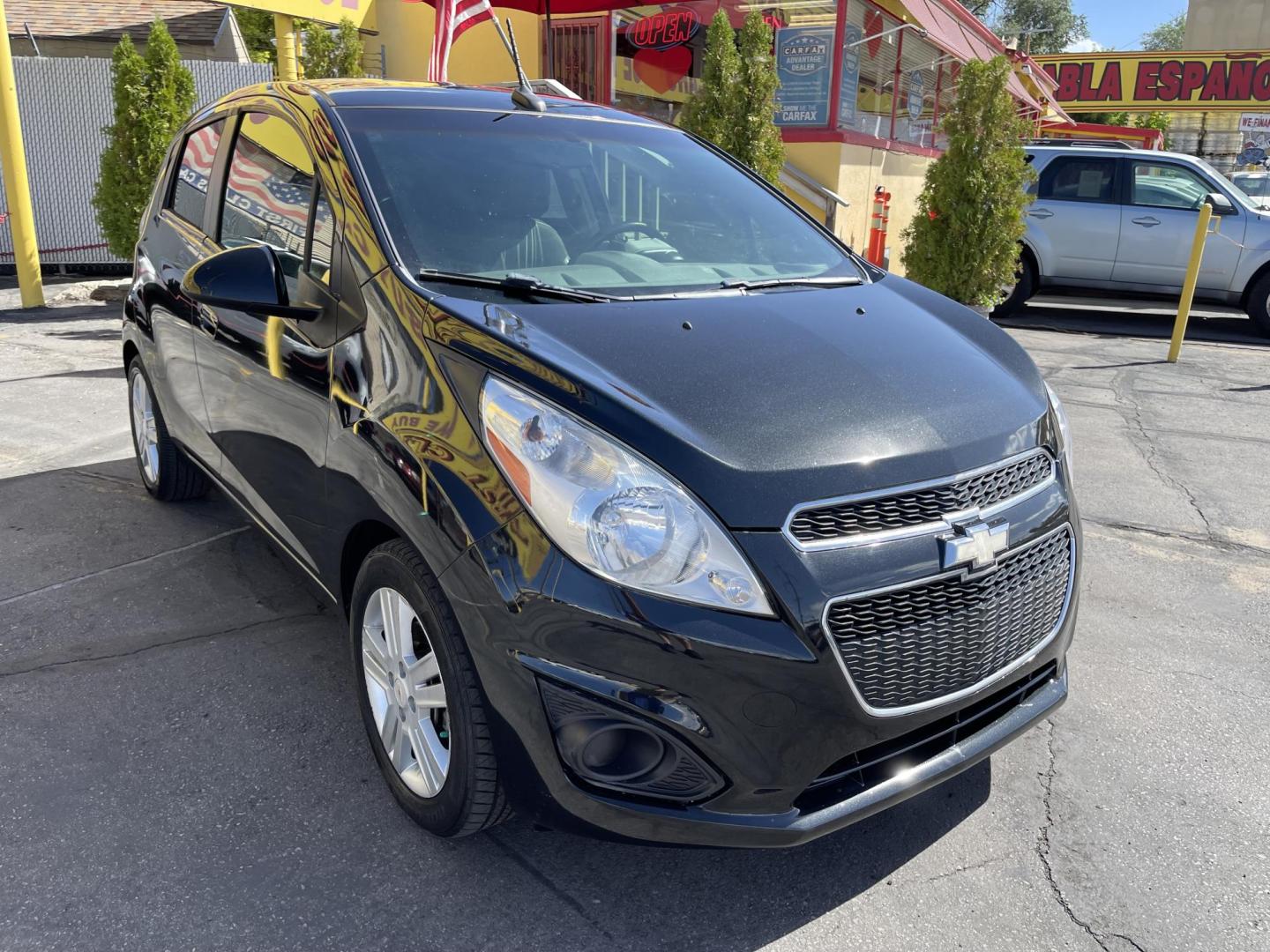 2013 Black /Black Chevrolet Spark LS Auto (KL8CB6S90DC) with an 1.2L L4 16V DOHC engine, 4-Speed Automatic transmission, located at 801 South State Street, Salt Lake City, UT, 84111, (801) 328-0098, 40.751953, -111.888206 - Clean title! Great gas saver! Low miles! Hard to find this clean with low miles at an affordable price range! Has been approved for up to a 5 year bumper to bumper warranty that can be purchased anywhere from 3 months up to 5 years for a powertrain warranty. Features: ABS Brakes, Air Conditioning, - Photo#4