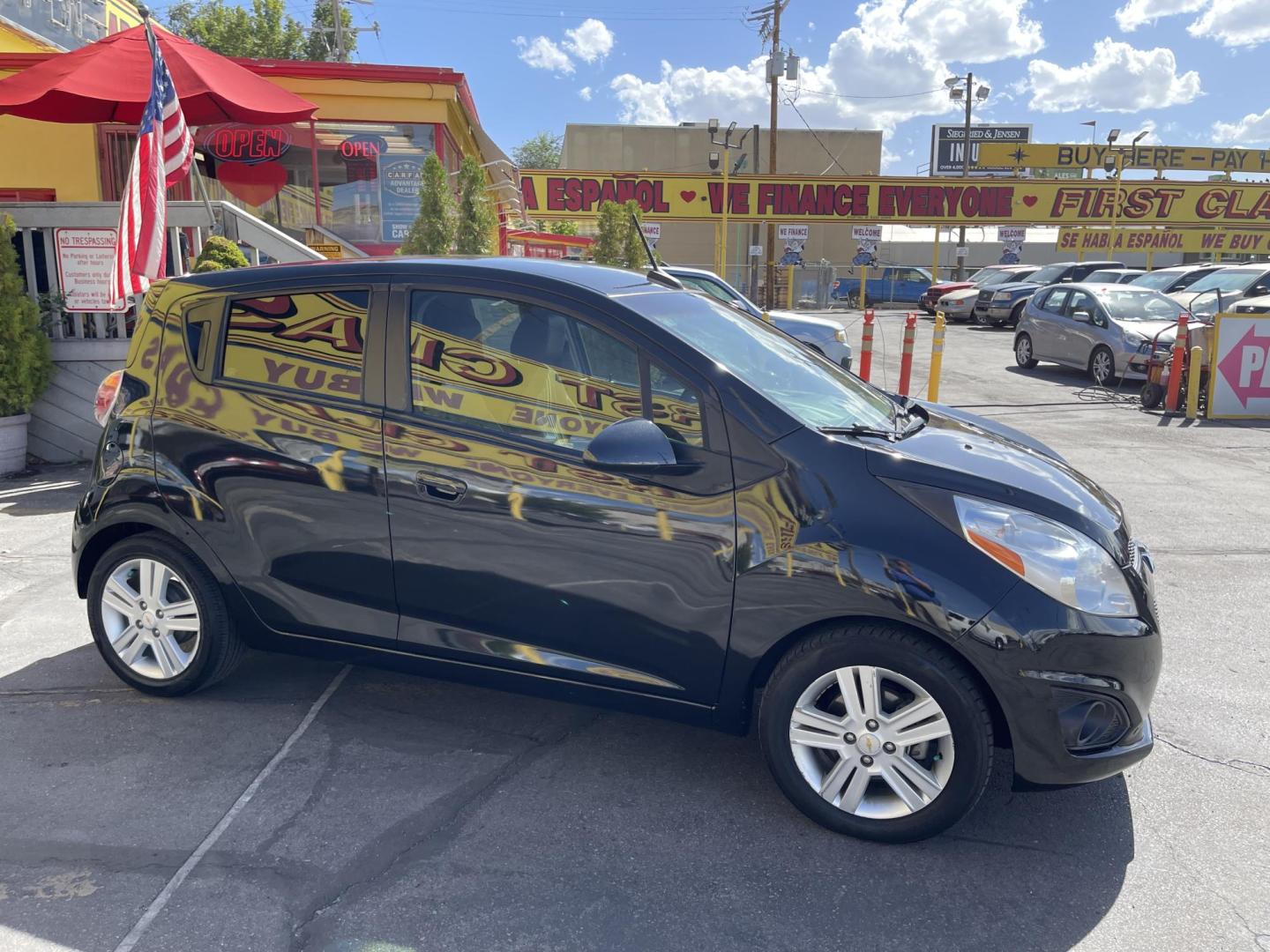 2013 Black /Black Chevrolet Spark LS Auto (KL8CB6S90DC) with an 1.2L L4 16V DOHC engine, 4-Speed Automatic transmission, located at 801 South State Street, Salt Lake City, UT, 84111, (801) 328-0098, 40.751953, -111.888206 - Clean title! Great gas saver! Low miles! Hard to find this clean with low miles at an affordable price range! Has been approved for up to a 5 year bumper to bumper warranty that can be purchased anywhere from 3 months up to 5 years for a powertrain warranty. Features: ABS Brakes, Air Conditioning, - Photo#5