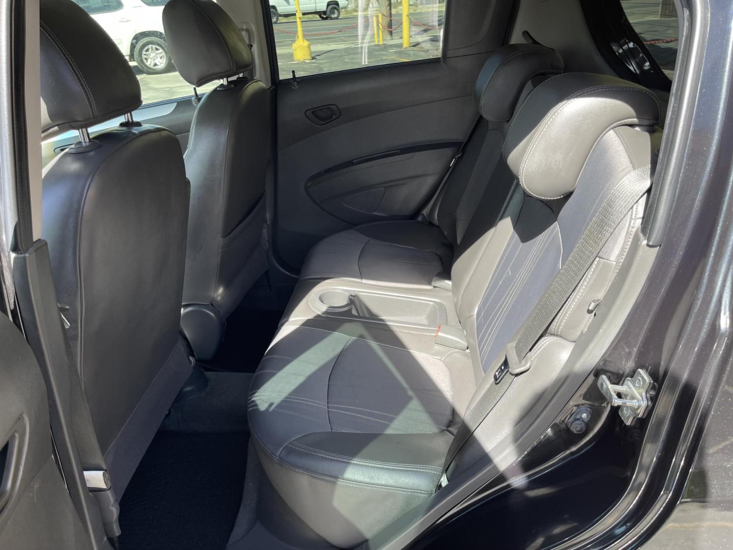 2013 Black /Black Chevrolet Spark LS Auto (KL8CB6S90DC) with an 1.2L L4 16V DOHC engine, 4-Speed Automatic transmission, located at 801 South State Street, Salt Lake City, UT, 84111, (801) 328-0098, 40.751953, -111.888206 - Clean title! Great gas saver! Low miles! Hard to find this clean with low miles at an affordable price range! Has been approved for up to a 5 year bumper to bumper warranty that can be purchased anywhere from 3 months up to 5 years for a powertrain warranty. Features: ABS Brakes, Air Conditioning, - Photo#13
