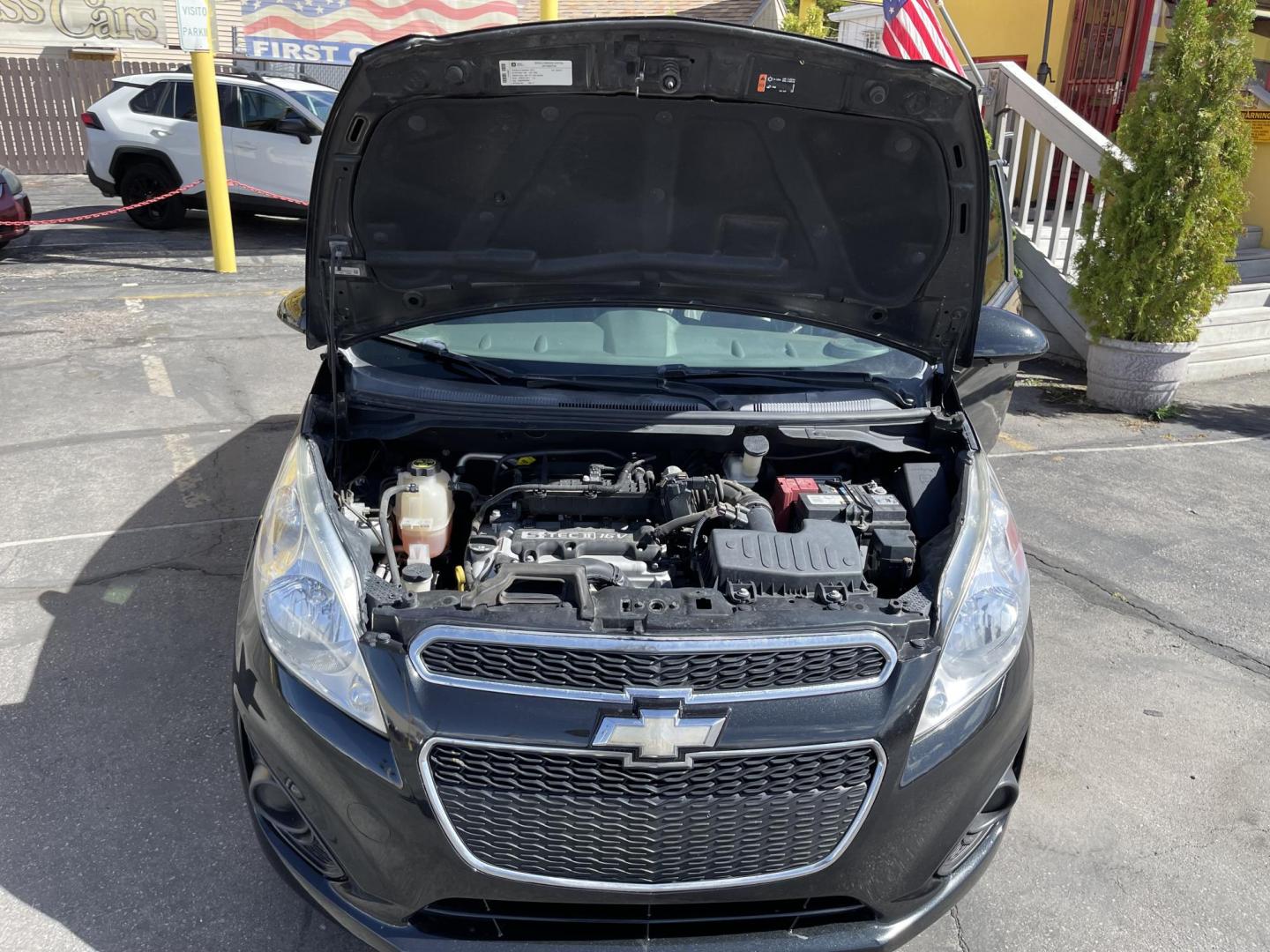 2013 Black /Black Chevrolet Spark LS Auto (KL8CB6S90DC) with an 1.2L L4 16V DOHC engine, 4-Speed Automatic transmission, located at 801 South State Street, Salt Lake City, UT, 84111, (801) 328-0098, 40.751953, -111.888206 - Clean title! Great gas saver! Low miles! Hard to find this clean with low miles at an affordable price range! Has been approved for up to a 5 year bumper to bumper warranty that can be purchased anywhere from 3 months up to 5 years for a powertrain warranty. Features: ABS Brakes, Air Conditioning, - Photo#21