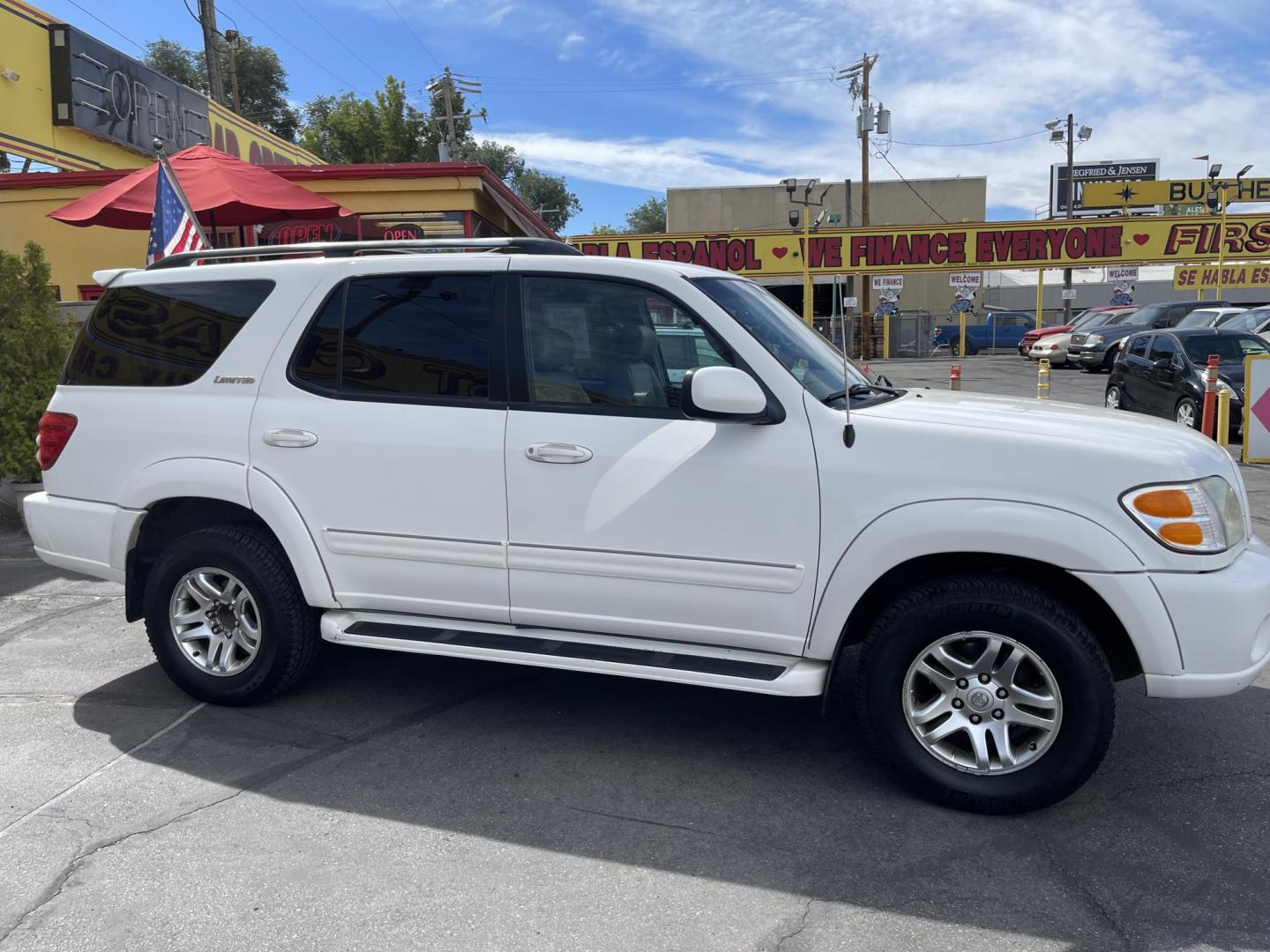 2004 Super White /Tan Toyota Sequoia Limited 4WD (5TDBT48A54S) with an 4.7L V8 DOHC 32V engine, 4-Speed Automatic Overdrive transmission, located at 801 South State Street, Salt Lake City, UT, 84111, (801) 328-0098, 40.751953, -111.888206 - Clean title! Nice 4x4 Sequoia in great condition for the year, make and miles. This Sequoia has been taken care of and maintained very well! Has passed inspections by our mechanic and approved for up to a 3 month up to 5 year warranty that covers every major part bumper to bumper. Features: Leather - Photo#5
