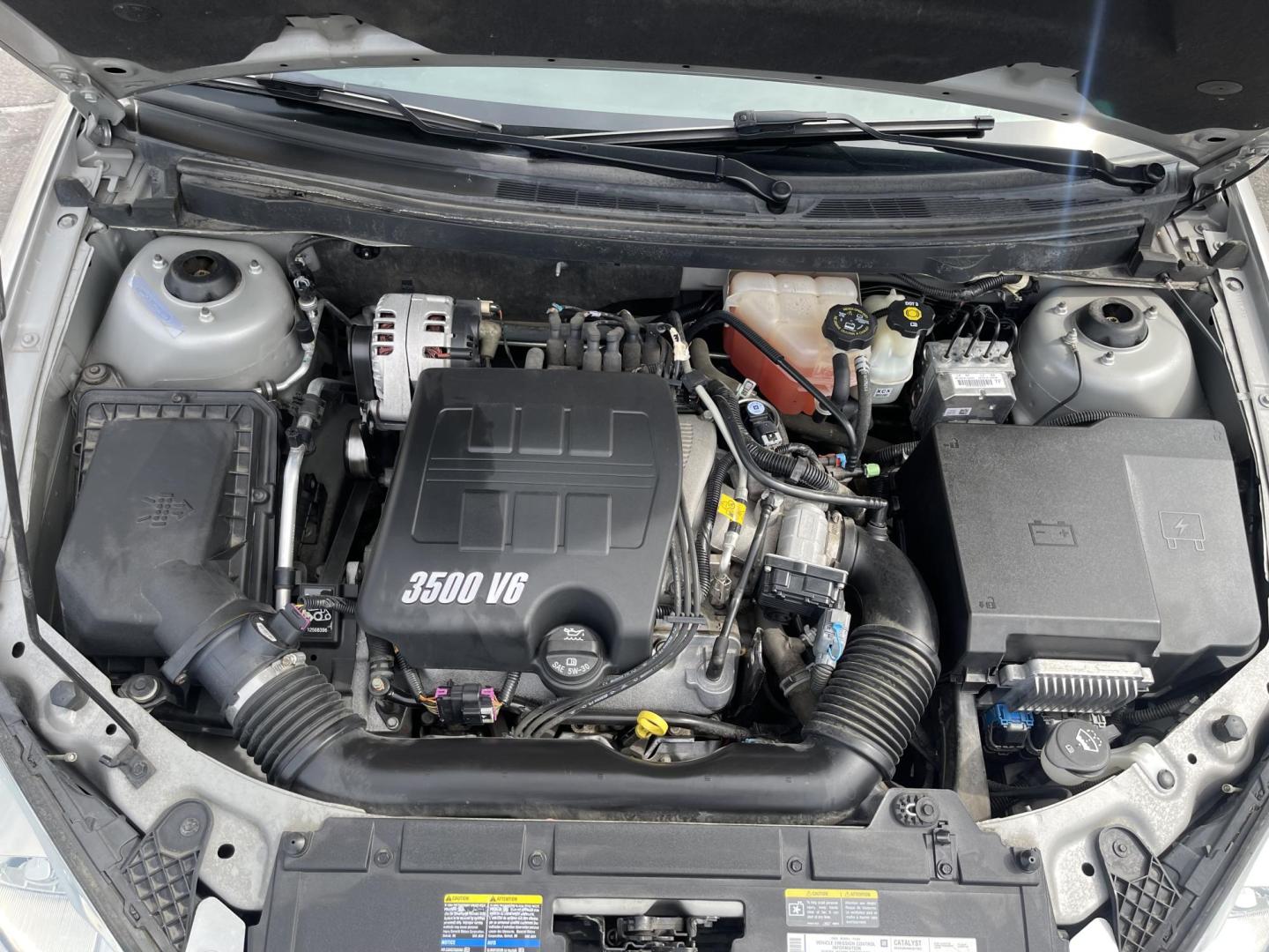 2006 Silver Sky Metallic /Black Pontiac G6 GT Coupe (1G2ZH158164) with an 3.5L V6 OHV 12V engine, 4-Speed Automatic Overdrive transmission, located at 801 South State Street, Salt Lake City, UT, 84111, (801) 328-0098, 40.751953, -111.888206 - Clean title, Wow Carfax 1 Owner extremely low miles only 36,554 miles very hard to find with miles like this! It was garaged most of its life and only driven occasionally by an older grandmother that never drove very much that is why the miles are so low. Car is in immaculate condition! Very clean! - Photo#20