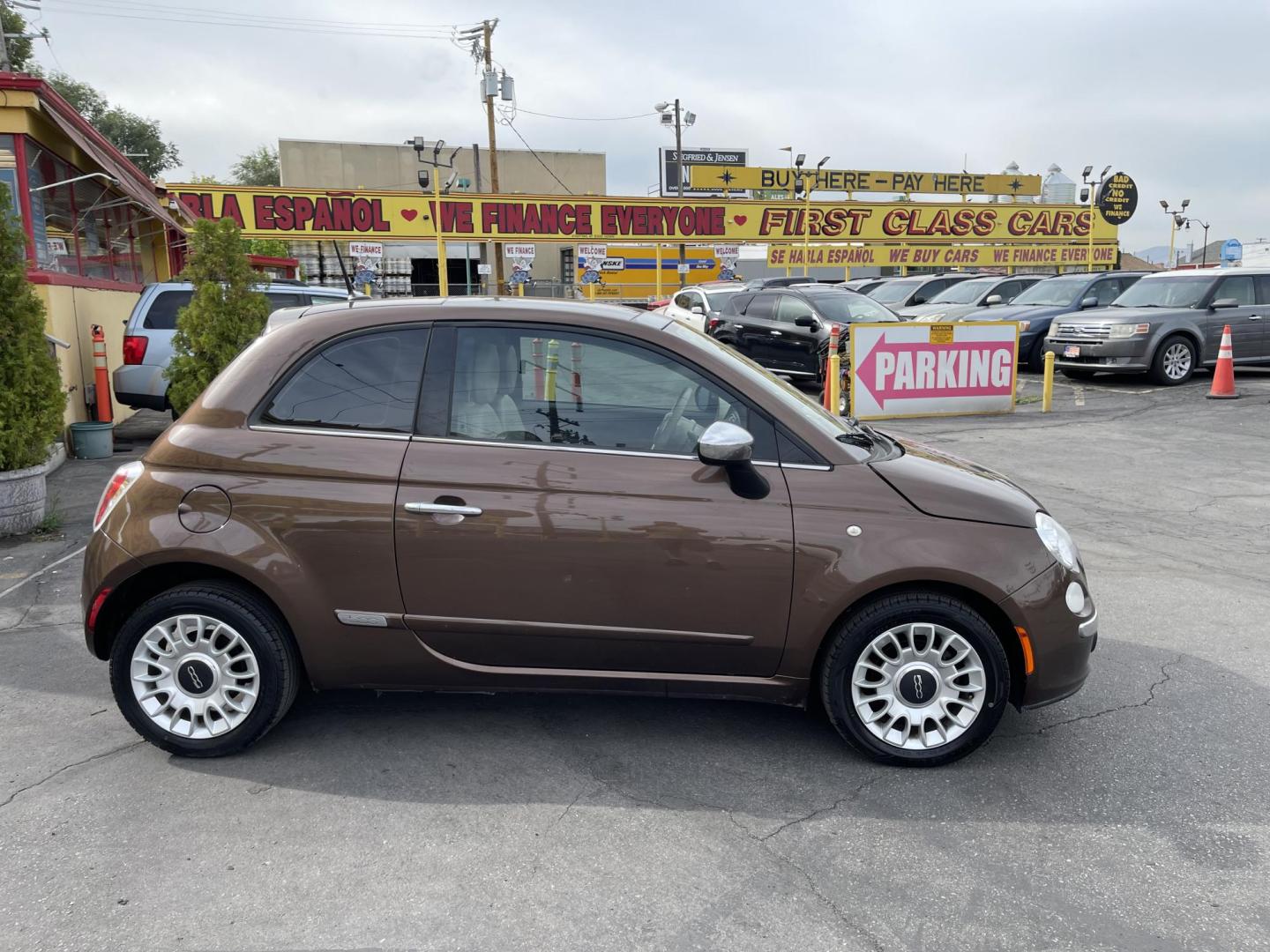 2013 Bamboo Pearl /BROWN Fiat 500 Lounge Hatchback (3C3CFFCR9DT) with an 1.4L L4 engine, 6-Speed Automatic transmission, located at 801 South State Street, Salt Lake City, UT, 84111, (801) 328-0098, 40.751953, -111.888206 - Clean title! No accidents on Carfax! Carfax shows only 2 owners no accidents clean title! Vehicle has been maintained and cared for Carfax show 16 maintenance service records that includes oil changes and maintenance. This has passed all inspections certifications and approved for up to a 5 year war - Photo#4