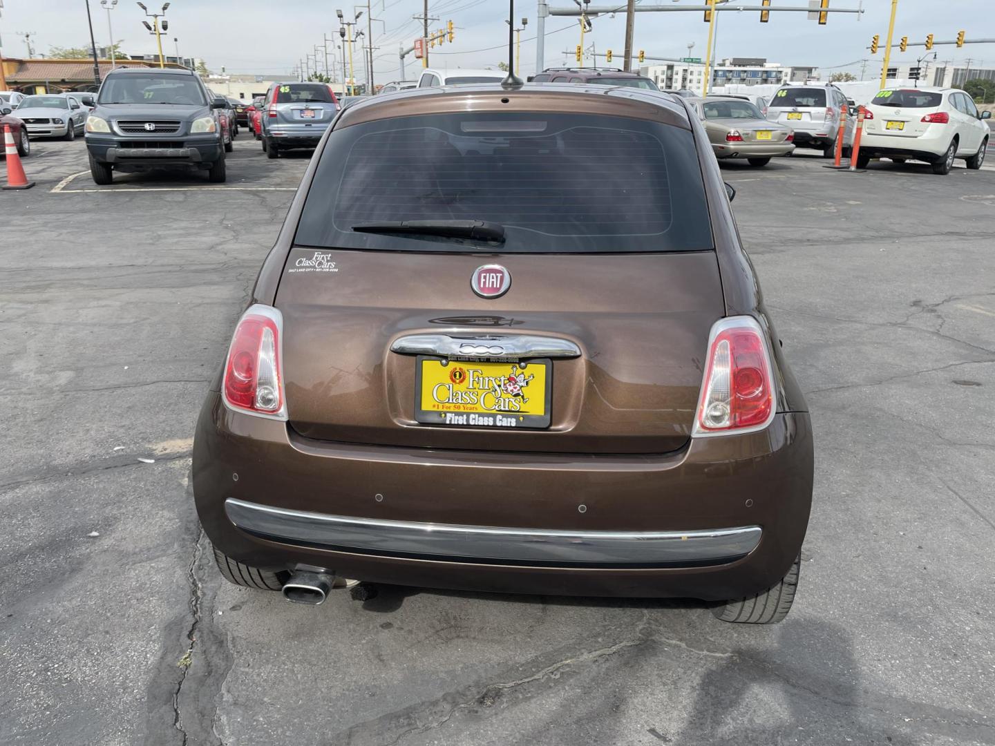 2013 Bamboo Pearl /BROWN Fiat 500 Lounge Hatchback (3C3CFFCR9DT) with an 1.4L L4 engine, 6-Speed Automatic transmission, located at 801 South State Street, Salt Lake City, UT, 84111, (801) 328-0098, 40.751953, -111.888206 - Clean title! No accidents on Carfax! Carfax shows only 2 owners no accidents clean title! Vehicle has been maintained and cared for Carfax show 16 maintenance service records that includes oil changes and maintenance. This has passed all inspections certifications and approved for up to a 5 year war - Photo#6