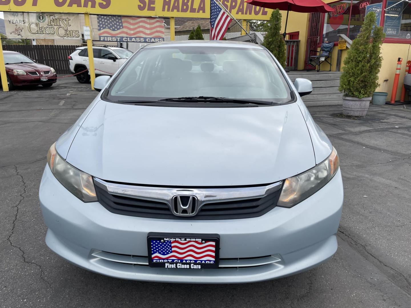 2012 Satin Silver Metallic /Gray Honda Civic LX Sedan 5-Speed AT (19XFB2F5XCE) with an 1.8L L4 SOHC 16V engine, 5-Speed Automatic transmission, located at 801 South State Street, Salt Lake City, UT, 84111, (801) 328-0098, 40.751953, -111.888206 - Clean title!!! No accidents on Carfax history report! Vehicle has been very well taken care of and maintained Carfax shows this vehicle has been serviced 25 times that includes oil changes and regular maintenance that has been performed. Great gas saver this 2012 Honda Civic LX with a 1.8L engine g - Photo#2