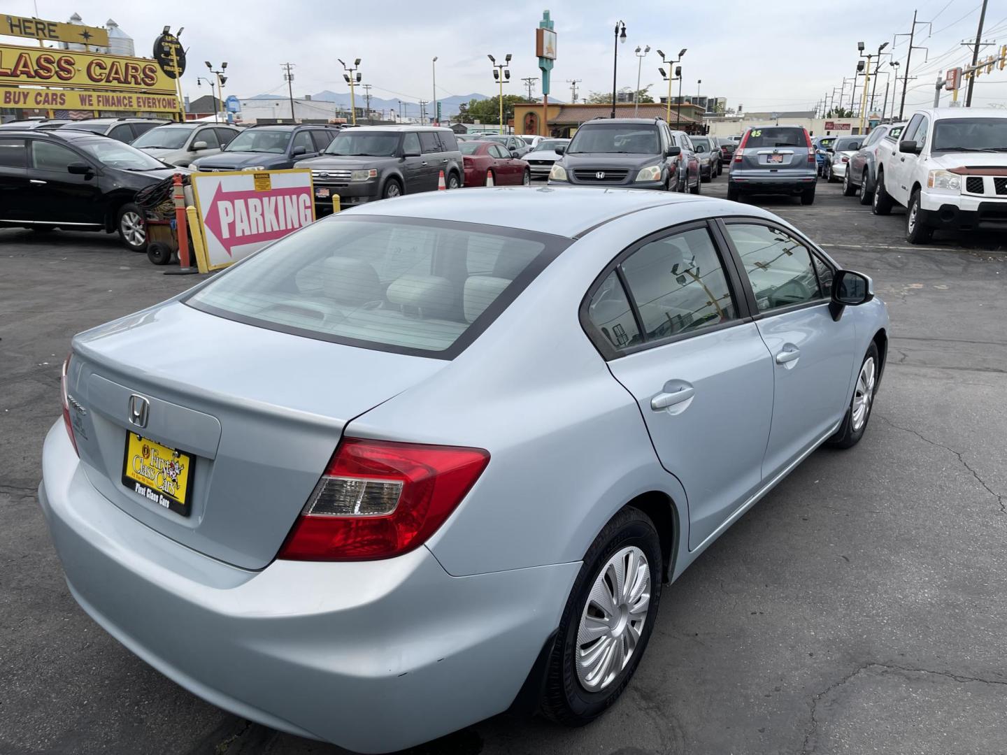 2012 Satin Silver Metallic /Gray Honda Civic LX Sedan 5-Speed AT (19XFB2F5XCE) with an 1.8L L4 SOHC 16V engine, 5-Speed Automatic transmission, located at 801 South State Street, Salt Lake City, UT, 84111, (801) 328-0098, 40.751953, -111.888206 - Clean title!!! No accidents on Carfax history report! Vehicle has been very well taken care of and maintained Carfax shows this vehicle has been serviced 25 times that includes oil changes and regular maintenance that has been performed. Great gas saver this 2012 Honda Civic LX with a 1.8L engine g - Photo#5