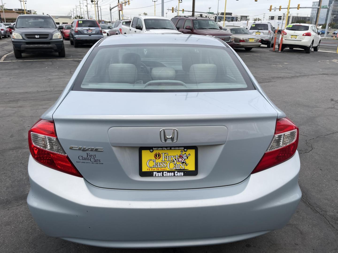 2012 Satin Silver Metallic /Gray Honda Civic LX Sedan 5-Speed AT (19XFB2F5XCE) with an 1.8L L4 SOHC 16V engine, 5-Speed Automatic transmission, located at 801 South State Street, Salt Lake City, UT, 84111, (801) 328-0098, 40.751953, -111.888206 - Clean title!!! No accidents on Carfax history report! Vehicle has been very well taken care of and maintained Carfax shows this vehicle has been serviced 25 times that includes oil changes and regular maintenance that has been performed. Great gas saver this 2012 Honda Civic LX with a 1.8L engine g - Photo#6