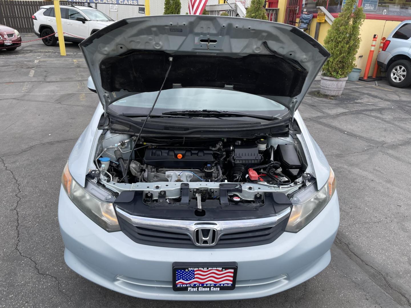 2012 Satin Silver Metallic /Gray Honda Civic LX Sedan 5-Speed AT (19XFB2F5XCE) with an 1.8L L4 SOHC 16V engine, 5-Speed Automatic transmission, located at 801 South State Street, Salt Lake City, UT, 84111, (801) 328-0098, 40.751953, -111.888206 - Clean title!!! No accidents on Carfax history report! Vehicle has been very well taken care of and maintained Carfax shows this vehicle has been serviced 25 times that includes oil changes and regular maintenance that has been performed. Great gas saver this 2012 Honda Civic LX with a 1.8L engine g - Photo#23