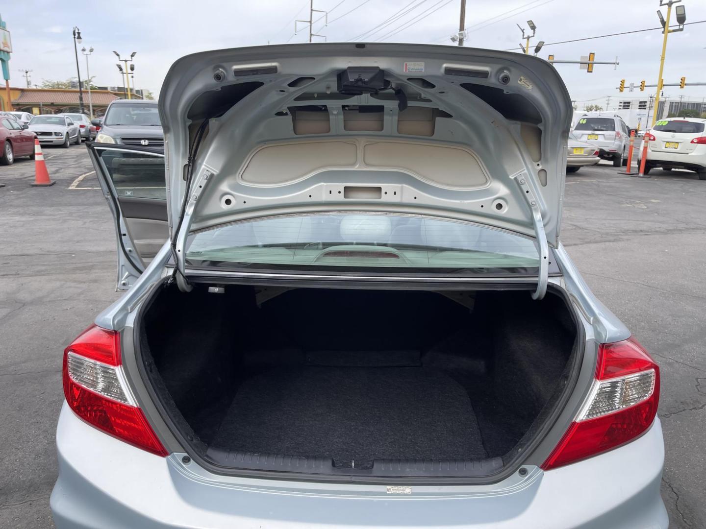 2012 Satin Silver Metallic /Gray Honda Civic LX Sedan 5-Speed AT (19XFB2F5XCE) with an 1.8L L4 SOHC 16V engine, 5-Speed Automatic transmission, located at 801 South State Street, Salt Lake City, UT, 84111, (801) 328-0098, 40.751953, -111.888206 - Clean title!!! No accidents on Carfax history report! Vehicle has been very well taken care of and maintained Carfax shows this vehicle has been serviced 25 times that includes oil changes and regular maintenance that has been performed. Great gas saver this 2012 Honda Civic LX with a 1.8L engine g - Photo#26